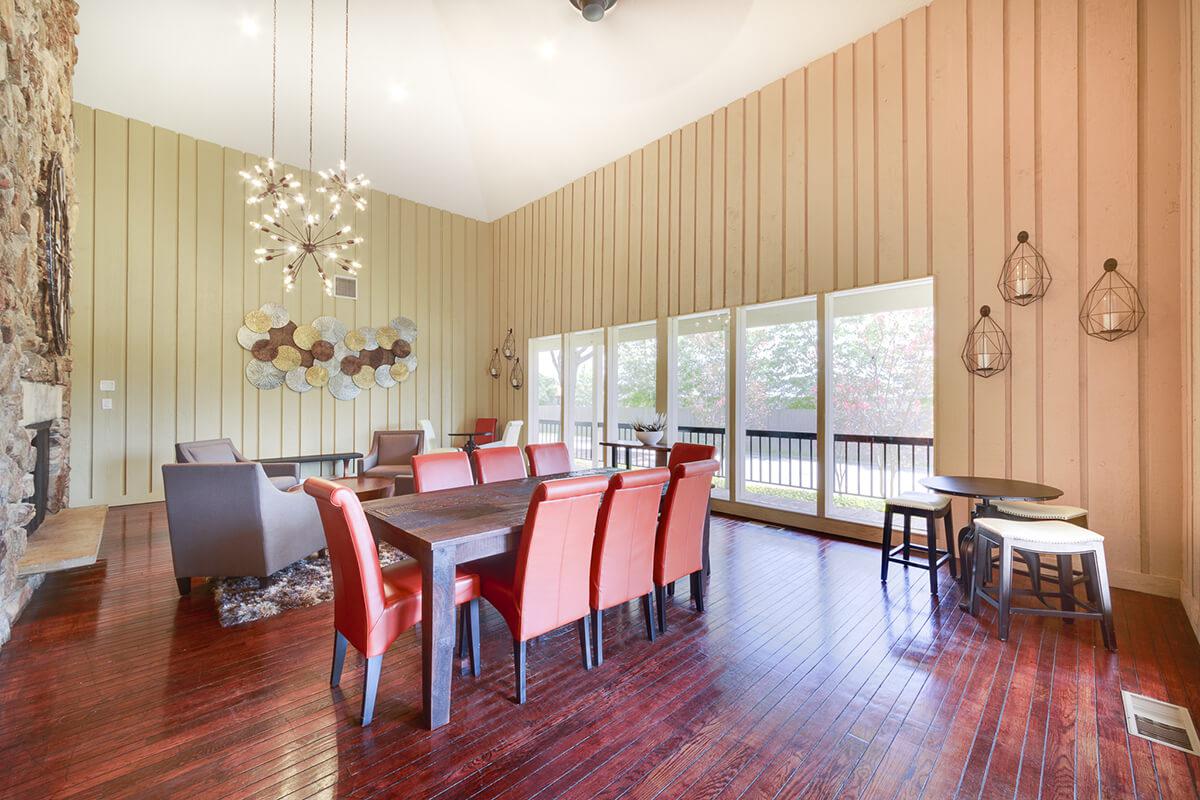 a living room filled with furniture and a table