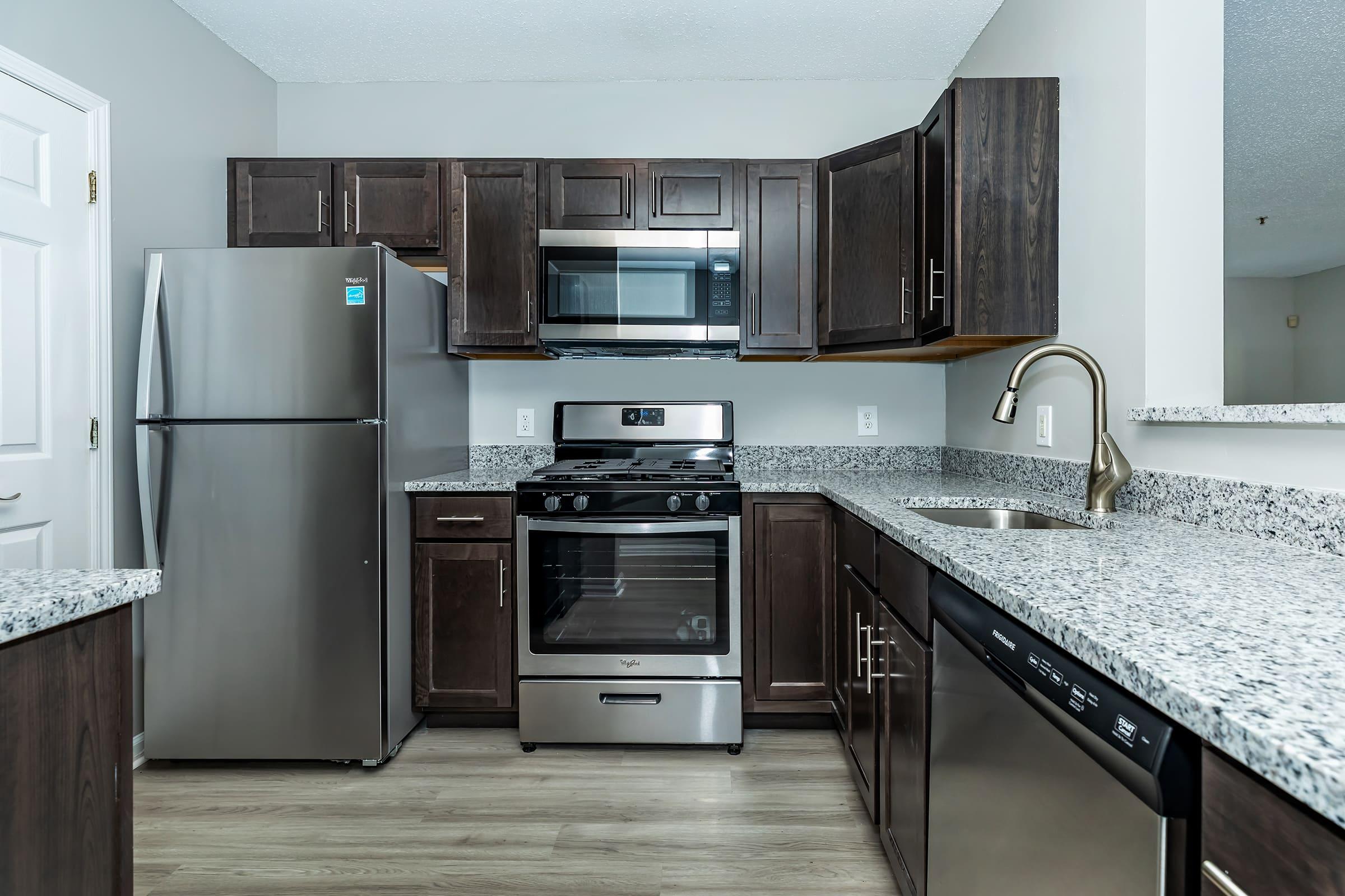 a modern kitchen with stainless steel appliances