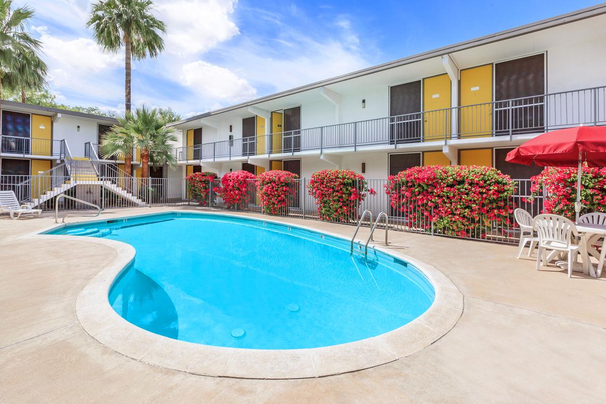 a pool in front of a building