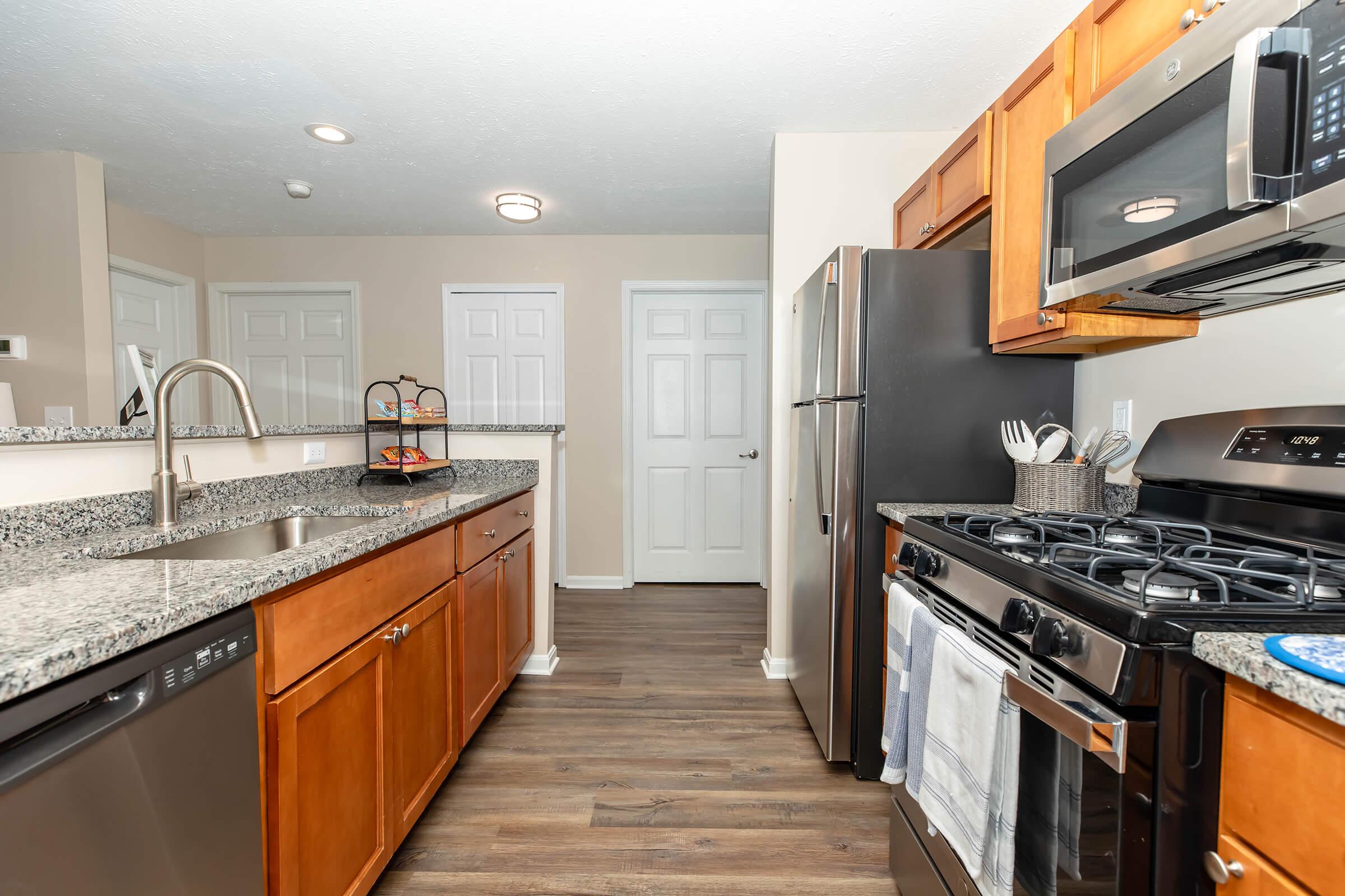 a modern kitchen with stainless steel appliances