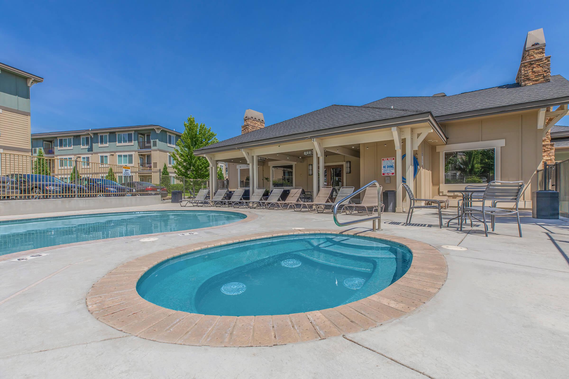 a pool in front of a building