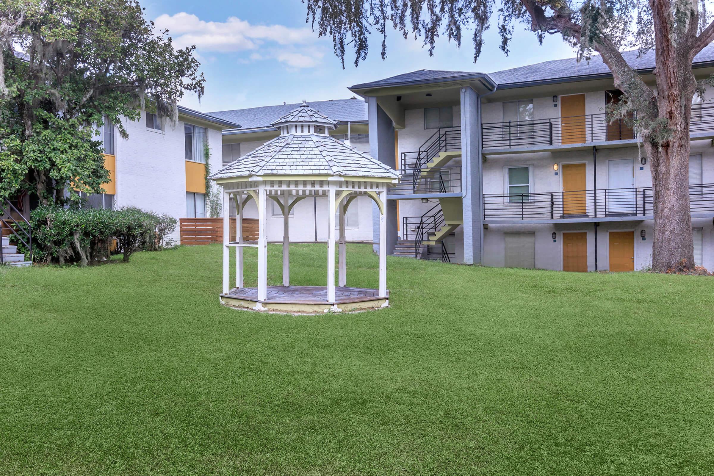 a large lawn in front of a house