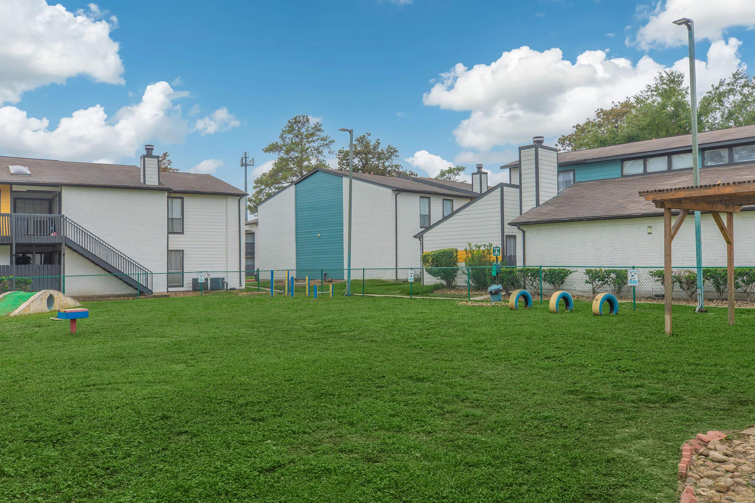 a large lawn in front of a building