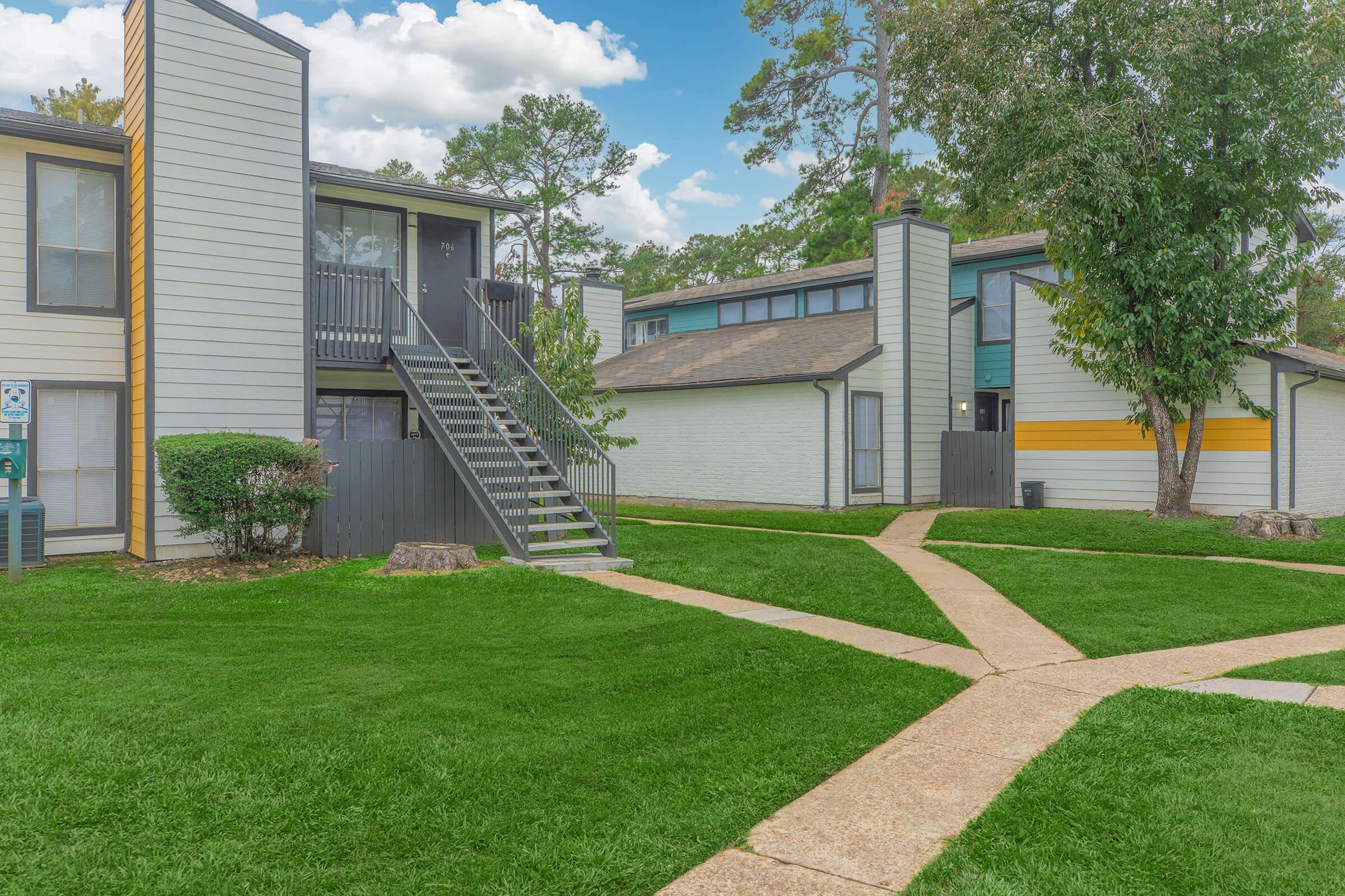 a large lawn in front of a house