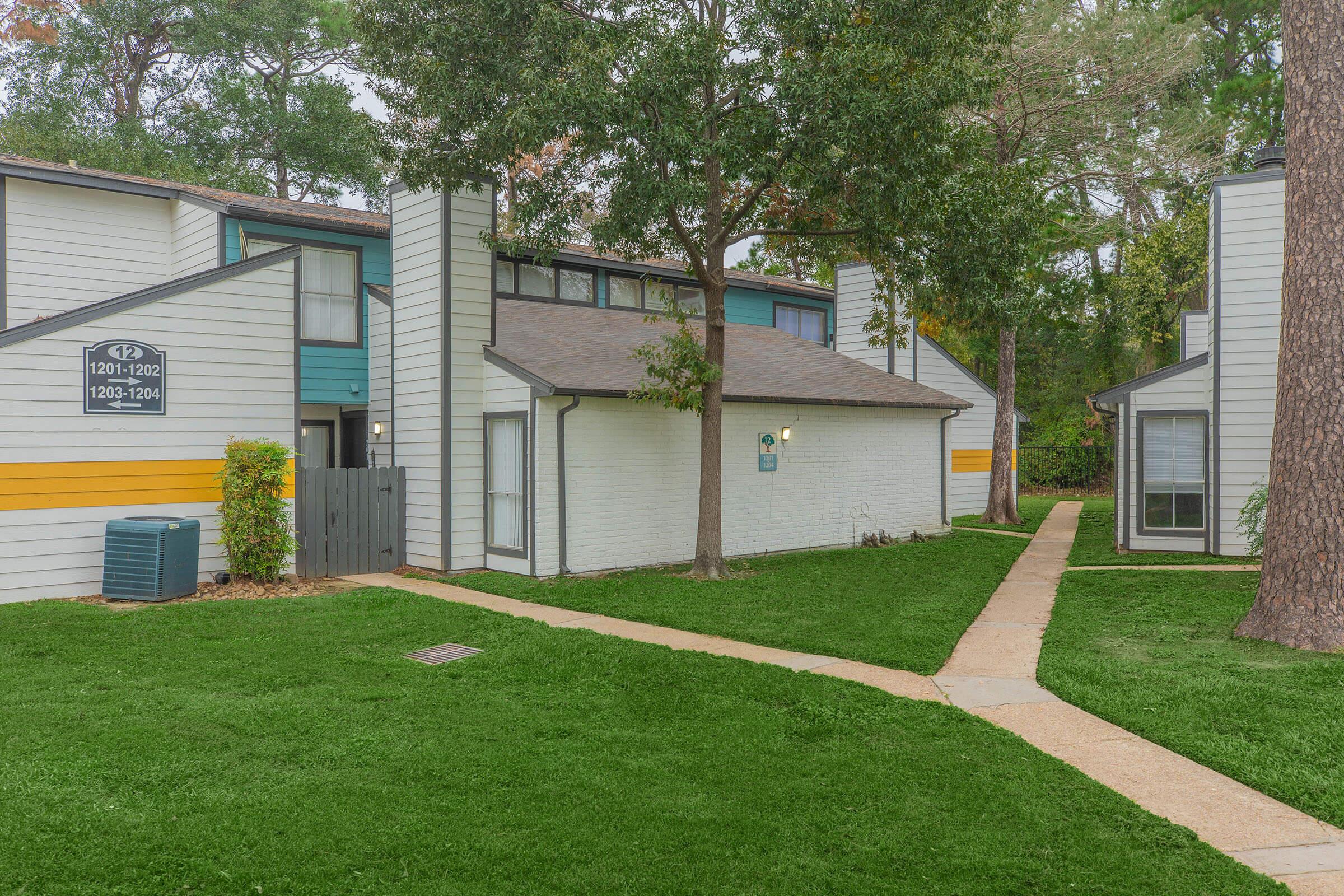 a large lawn in front of a house