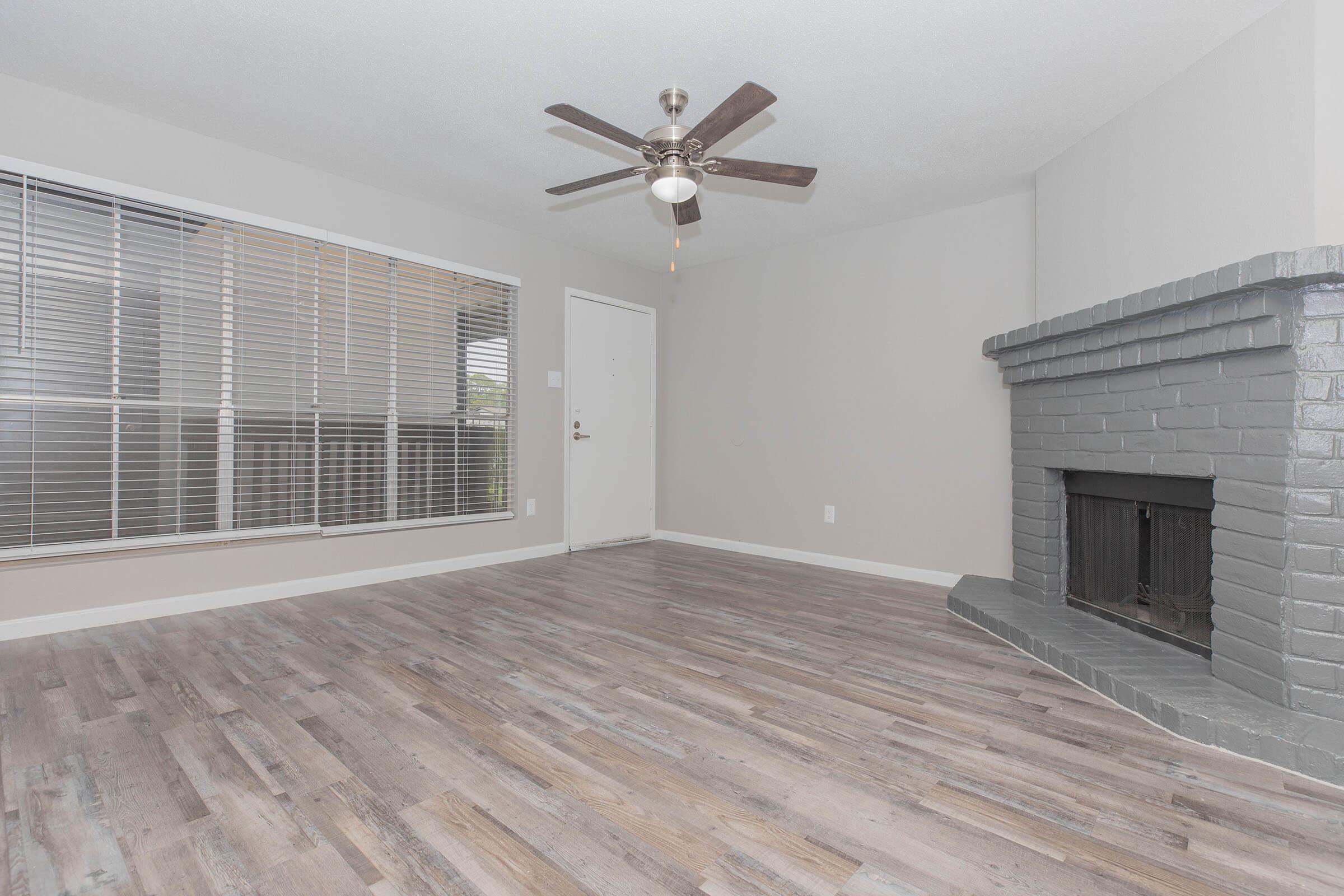 a living area with a building in the background