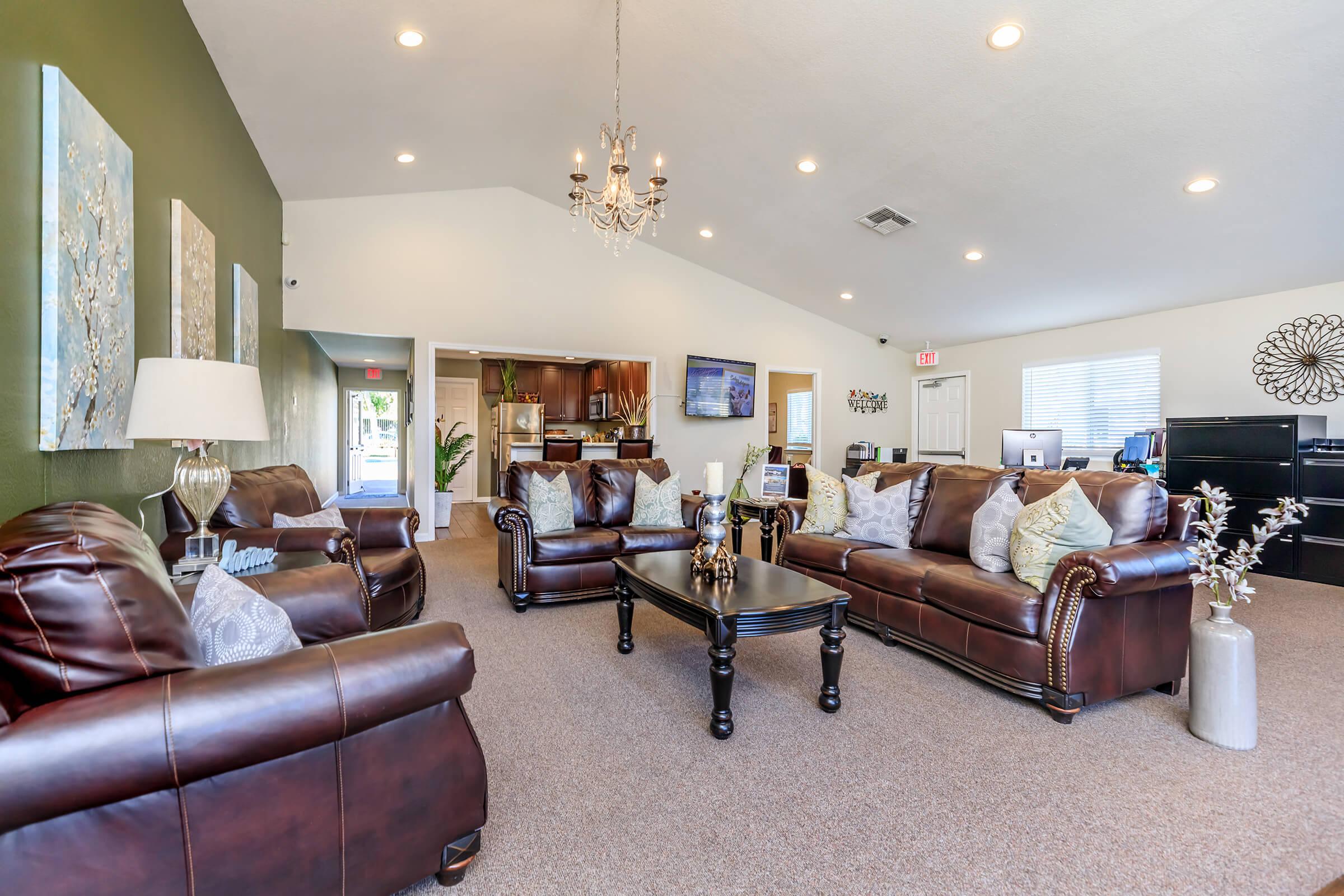 a living room filled with lots of furniture