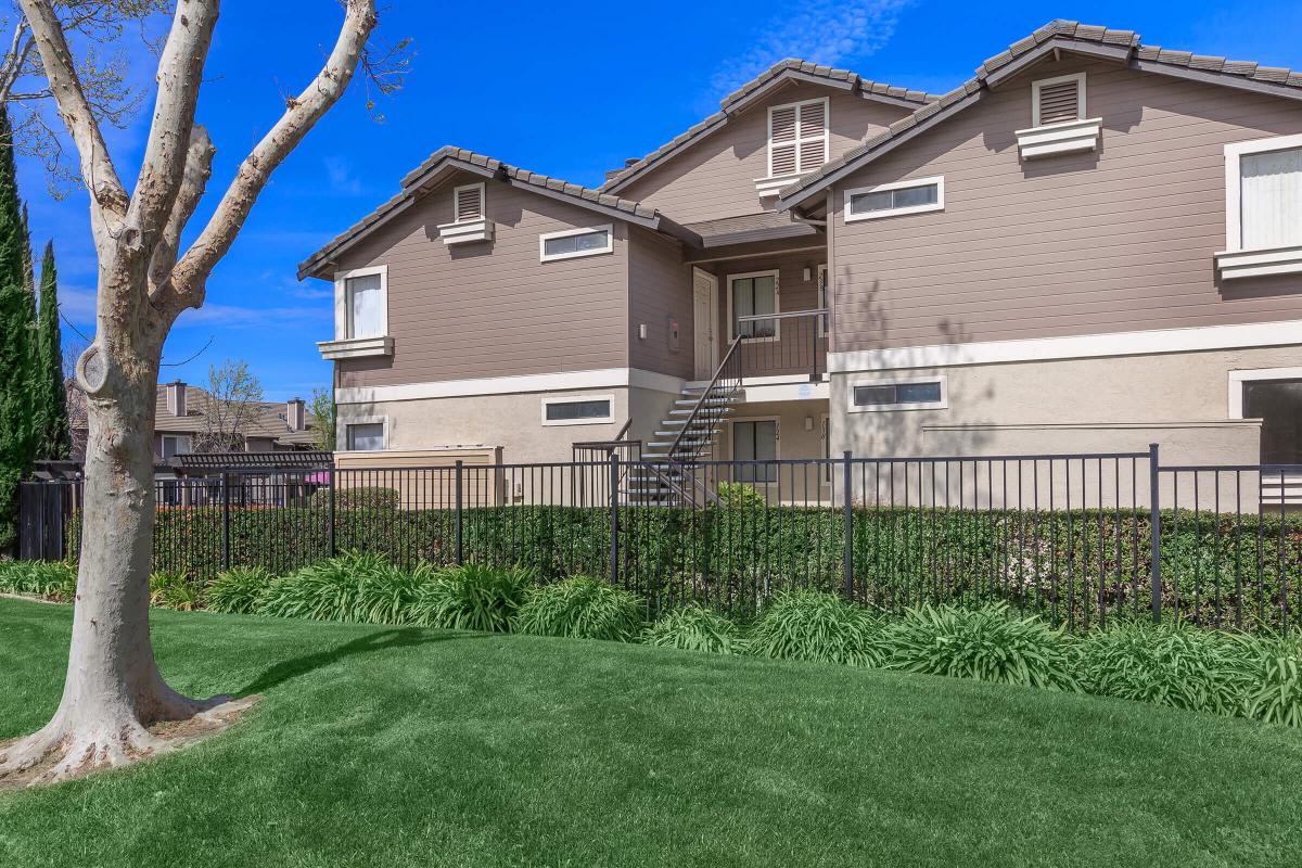 a large lawn in front of a house