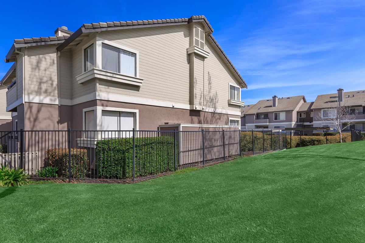 a large lawn in front of a house