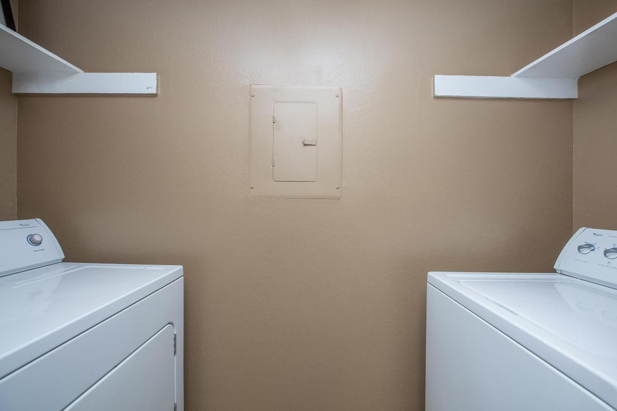 a white refrigerator freezer sitting in a room