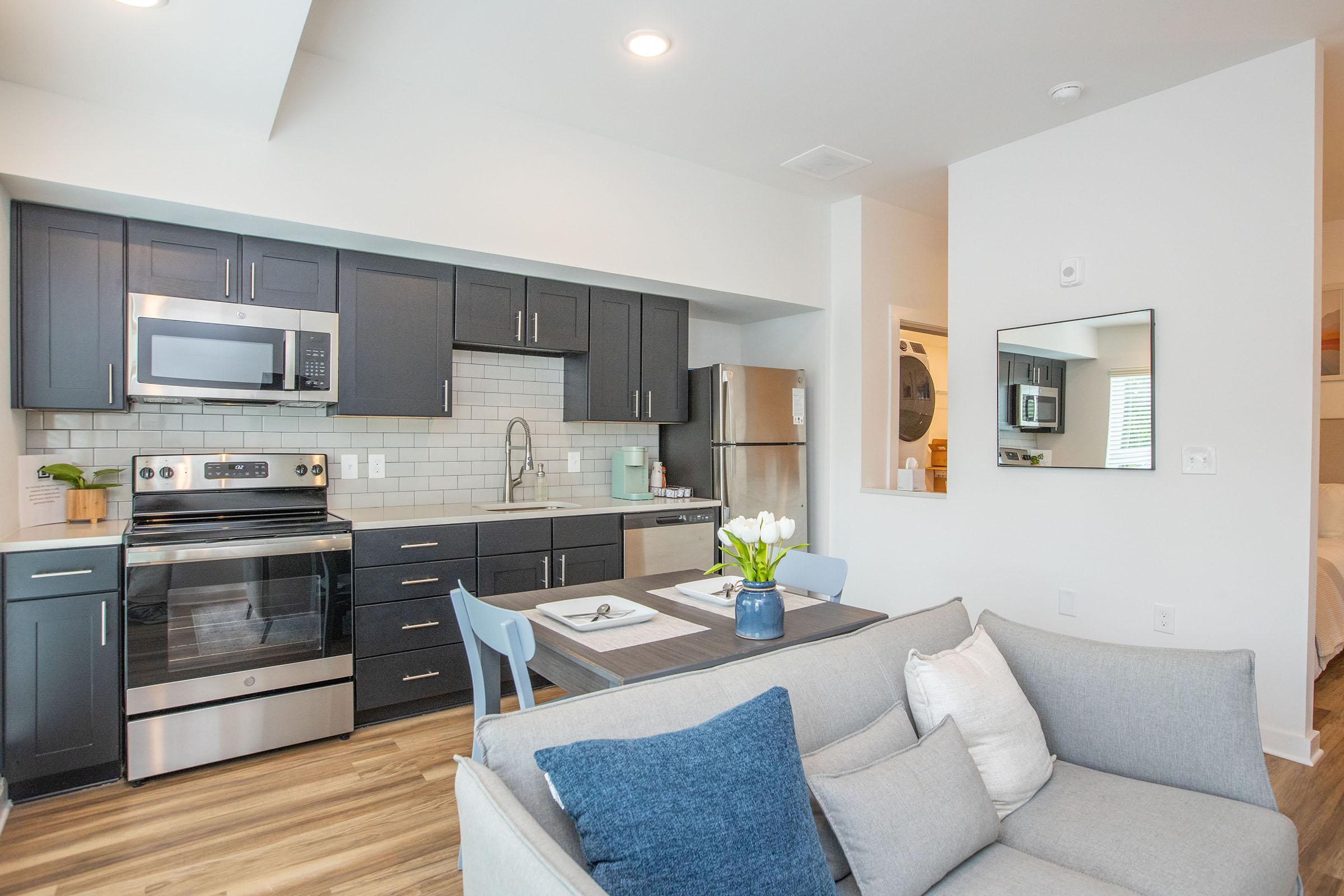 Each kitchen has stainless steel appliances at Studio 79