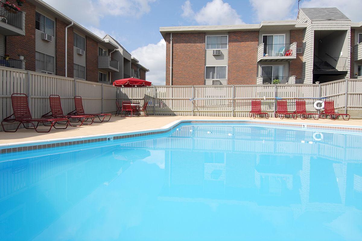 a large pool of water in front of a building