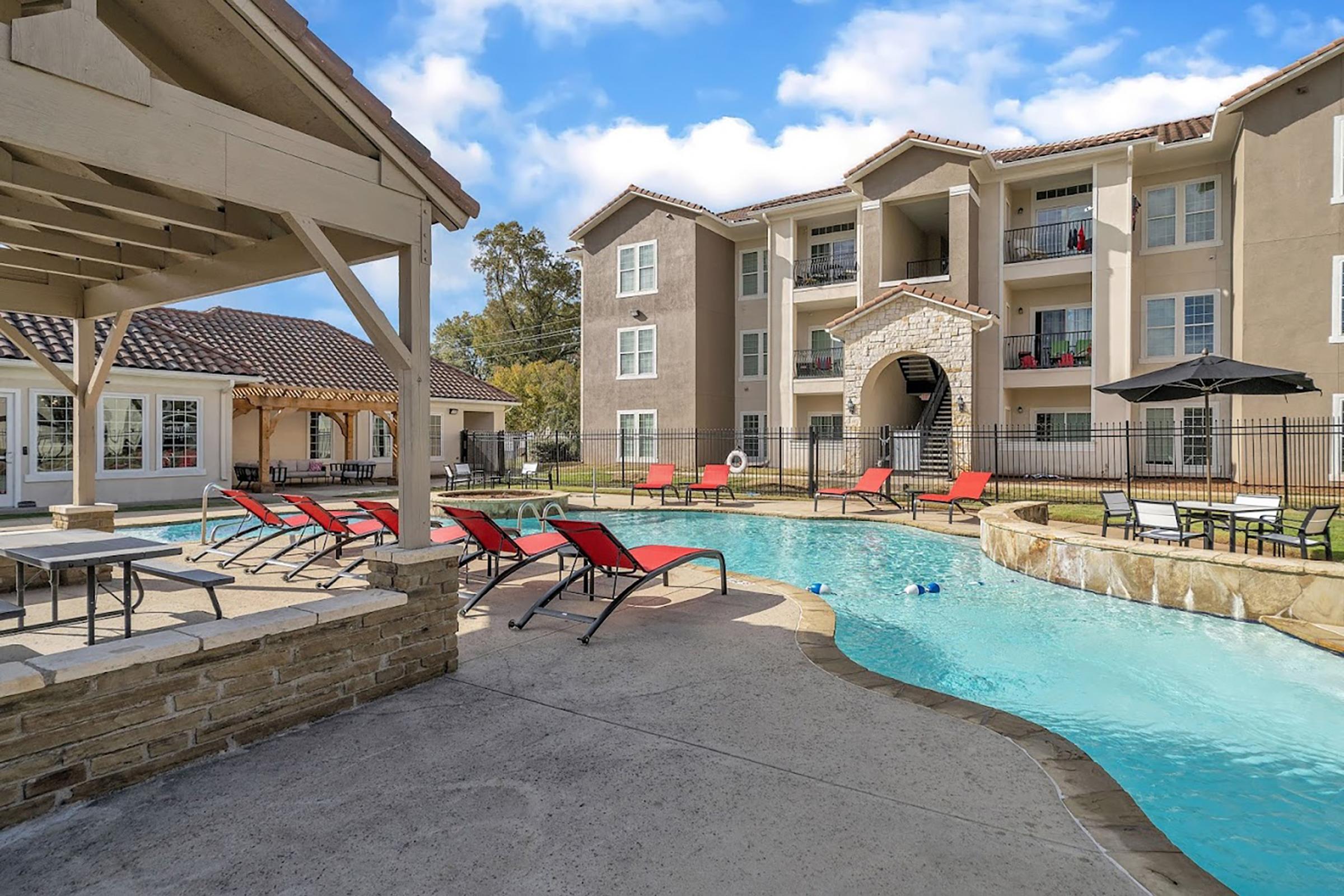 a pool next to a building