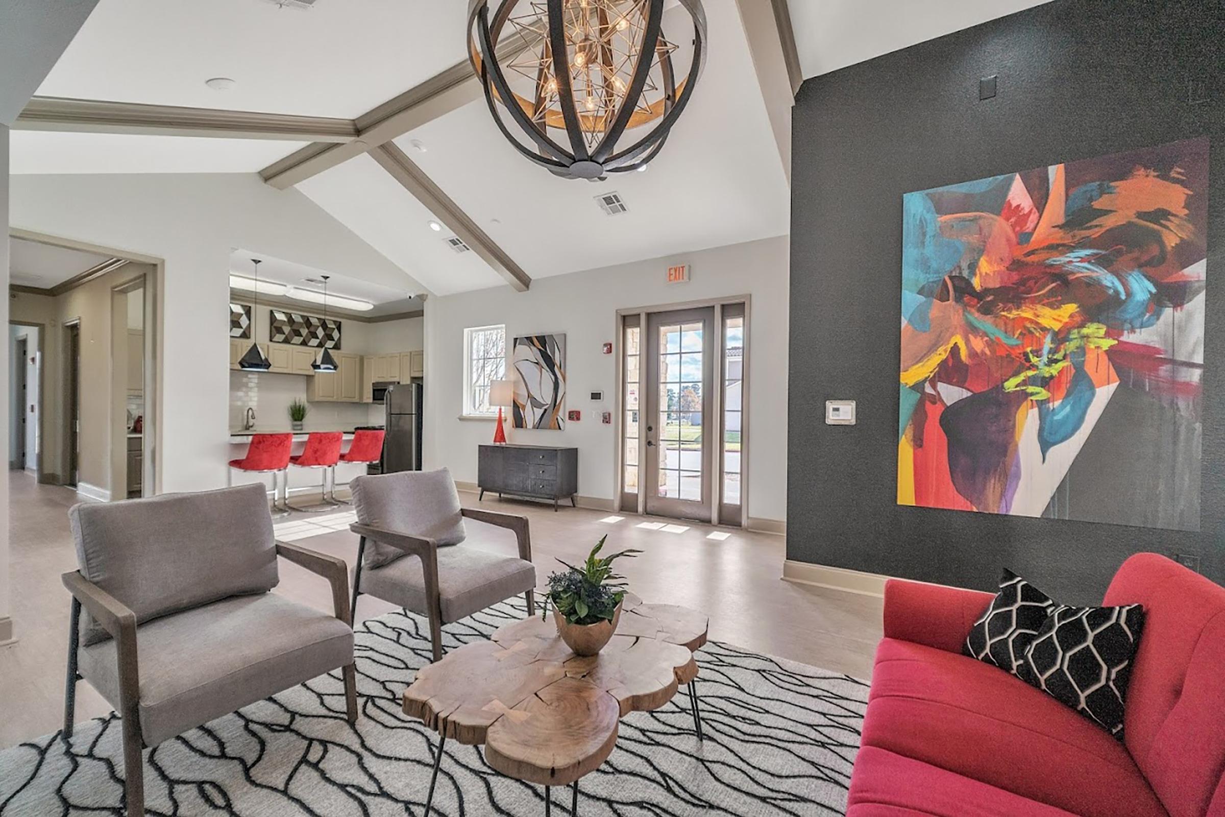 a living room filled with furniture and a fire place