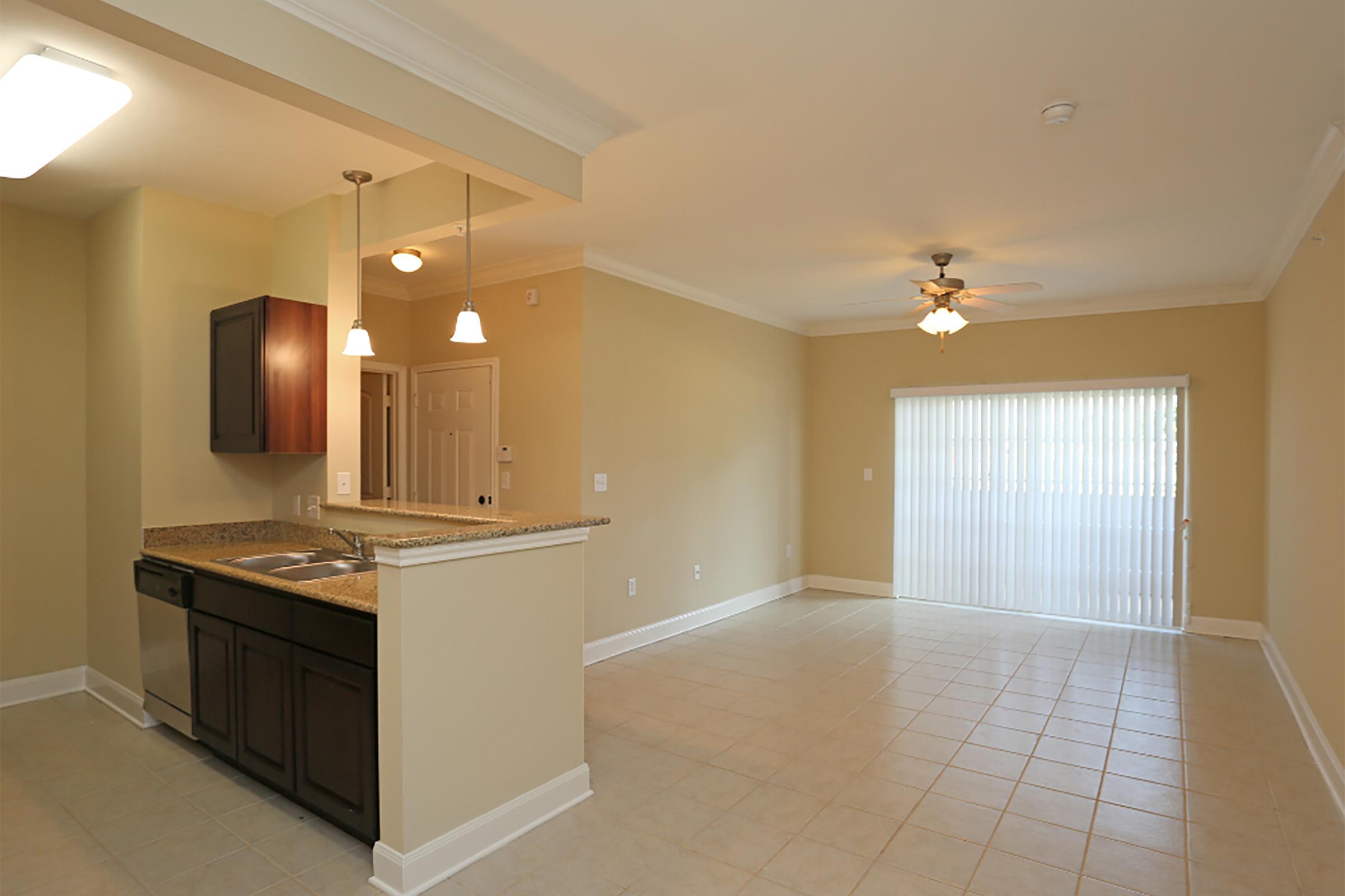 a kitchen with an island in the middle of a room