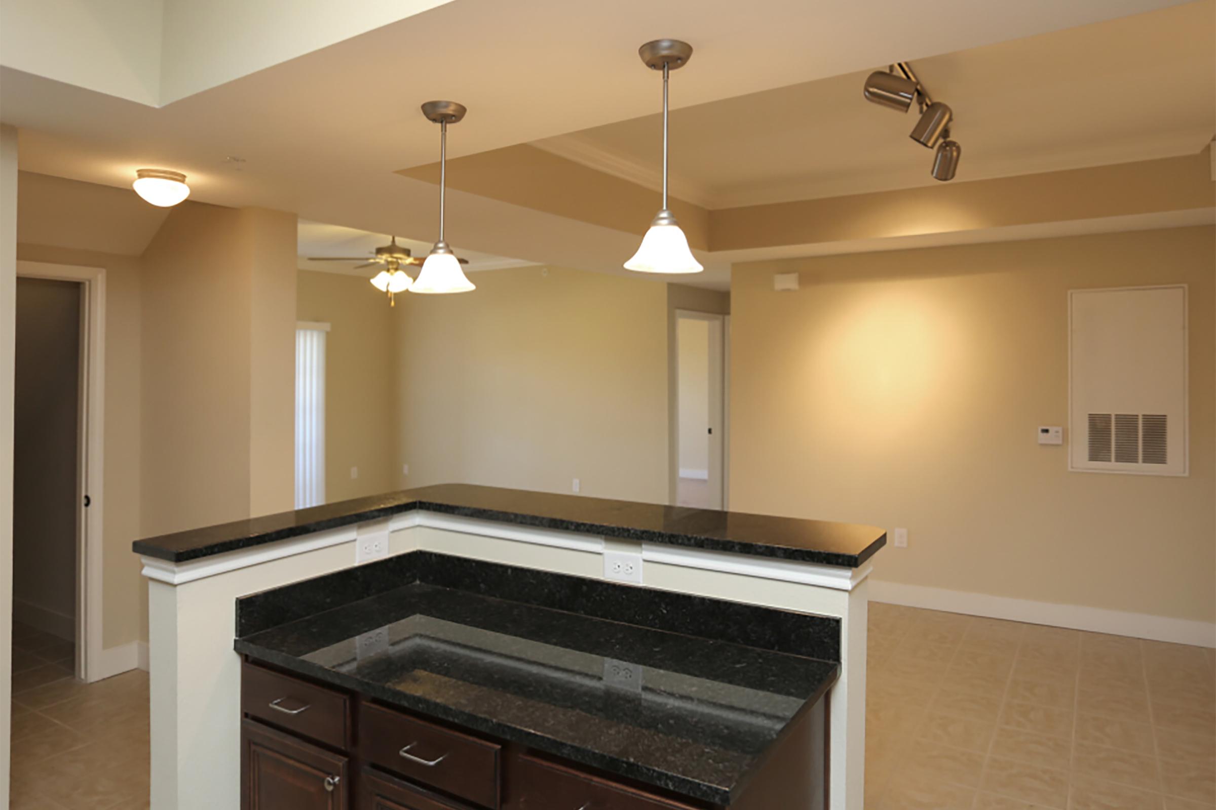 a kitchen with a stove and a sink