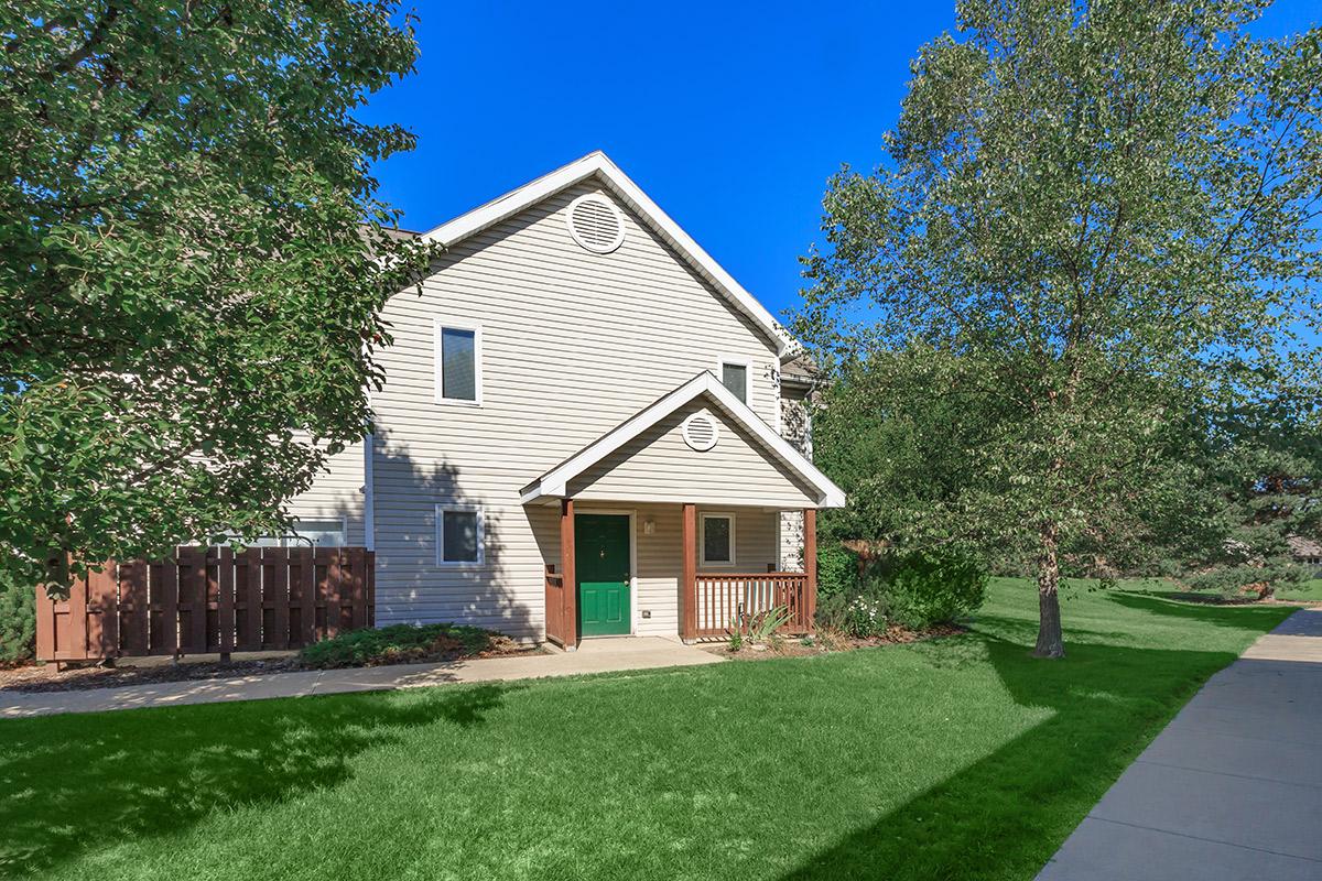 a large lawn in front of a house