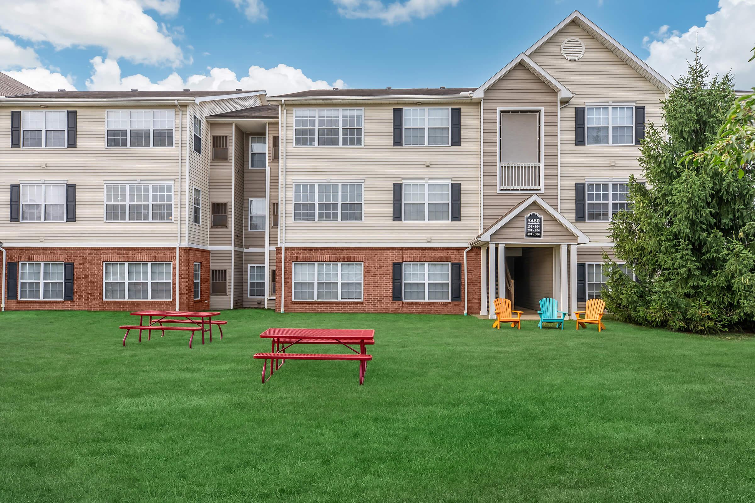 a large lawn in front of a house