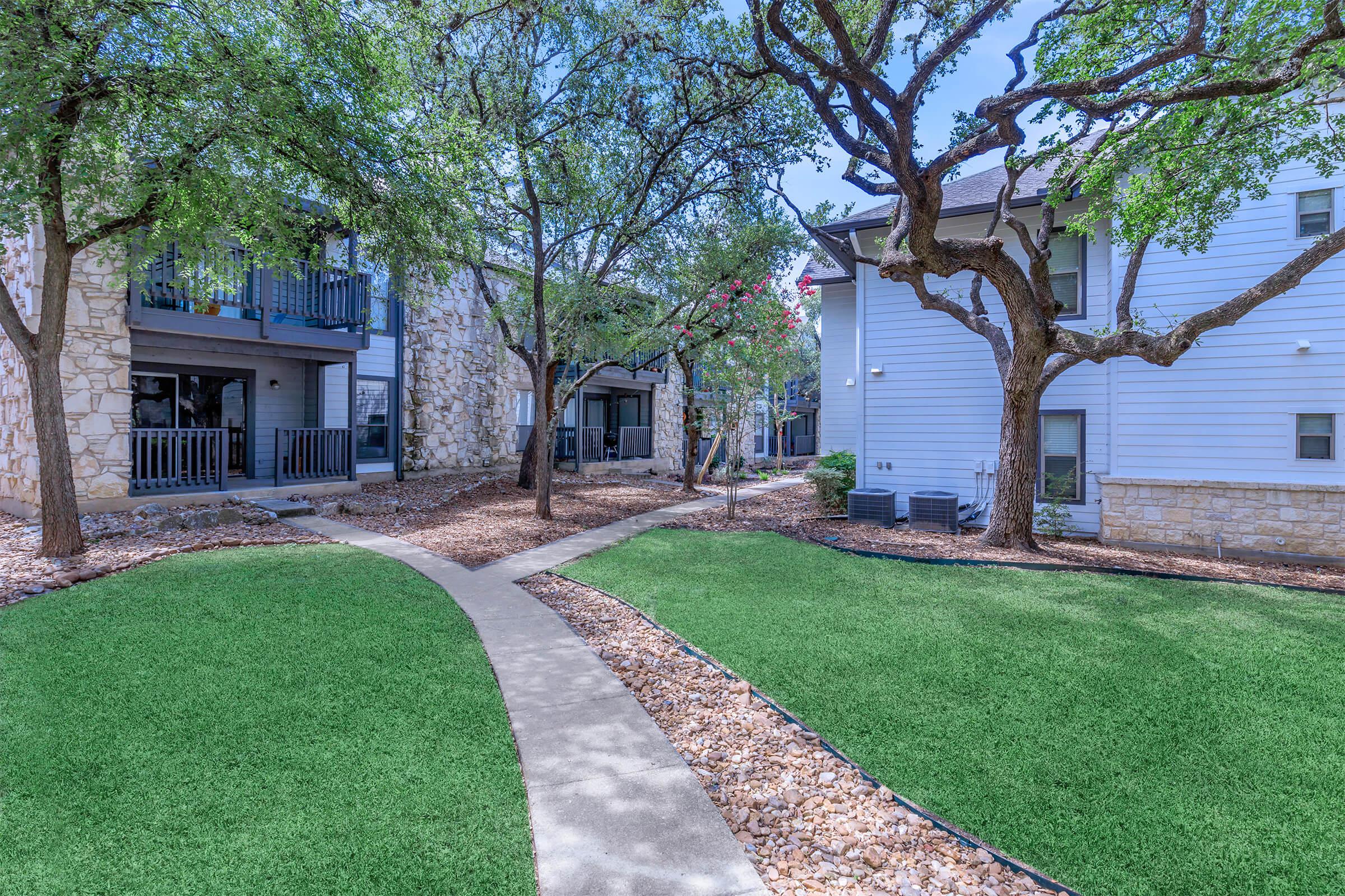 a large lawn in front of a house