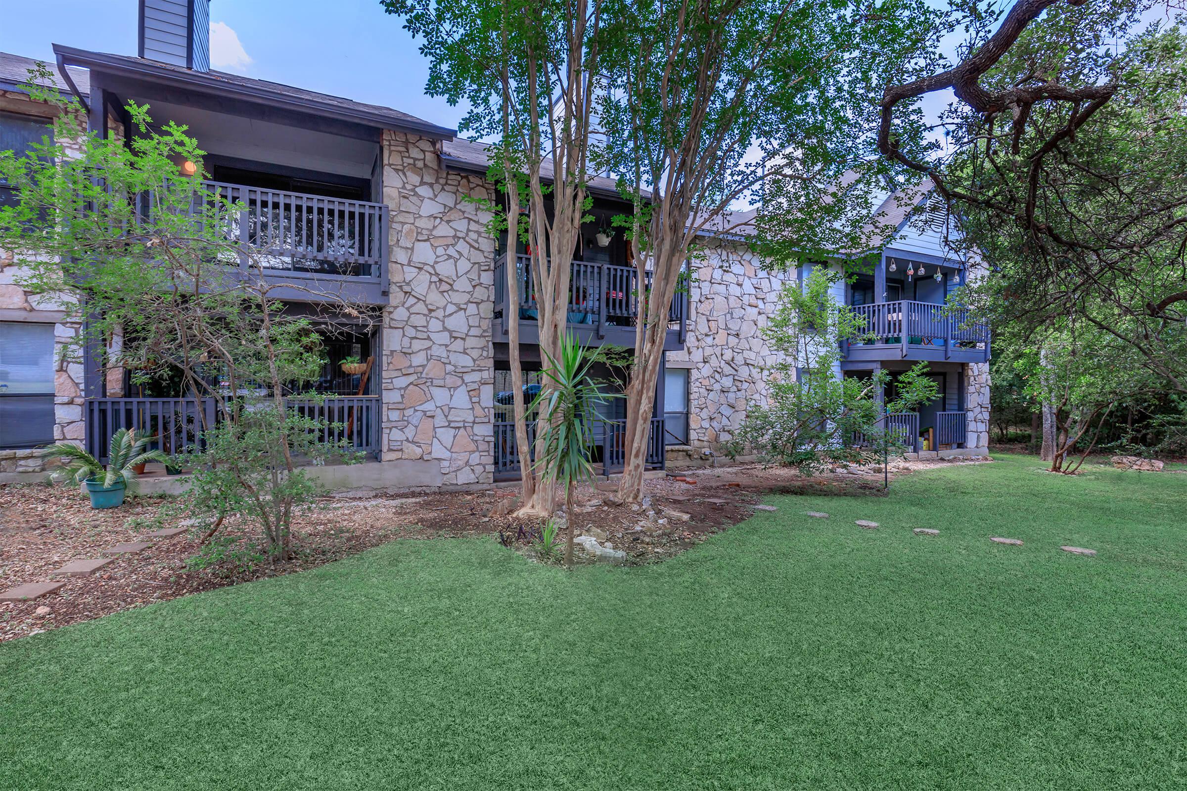 a large lawn in front of a house