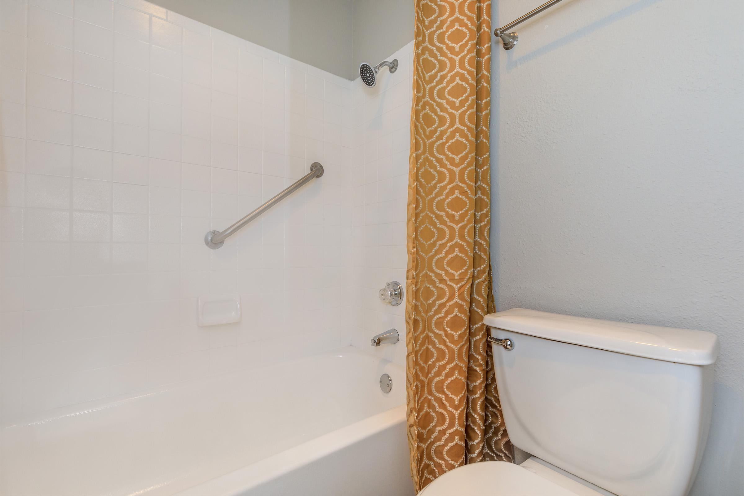 a close up of a shower in a small room