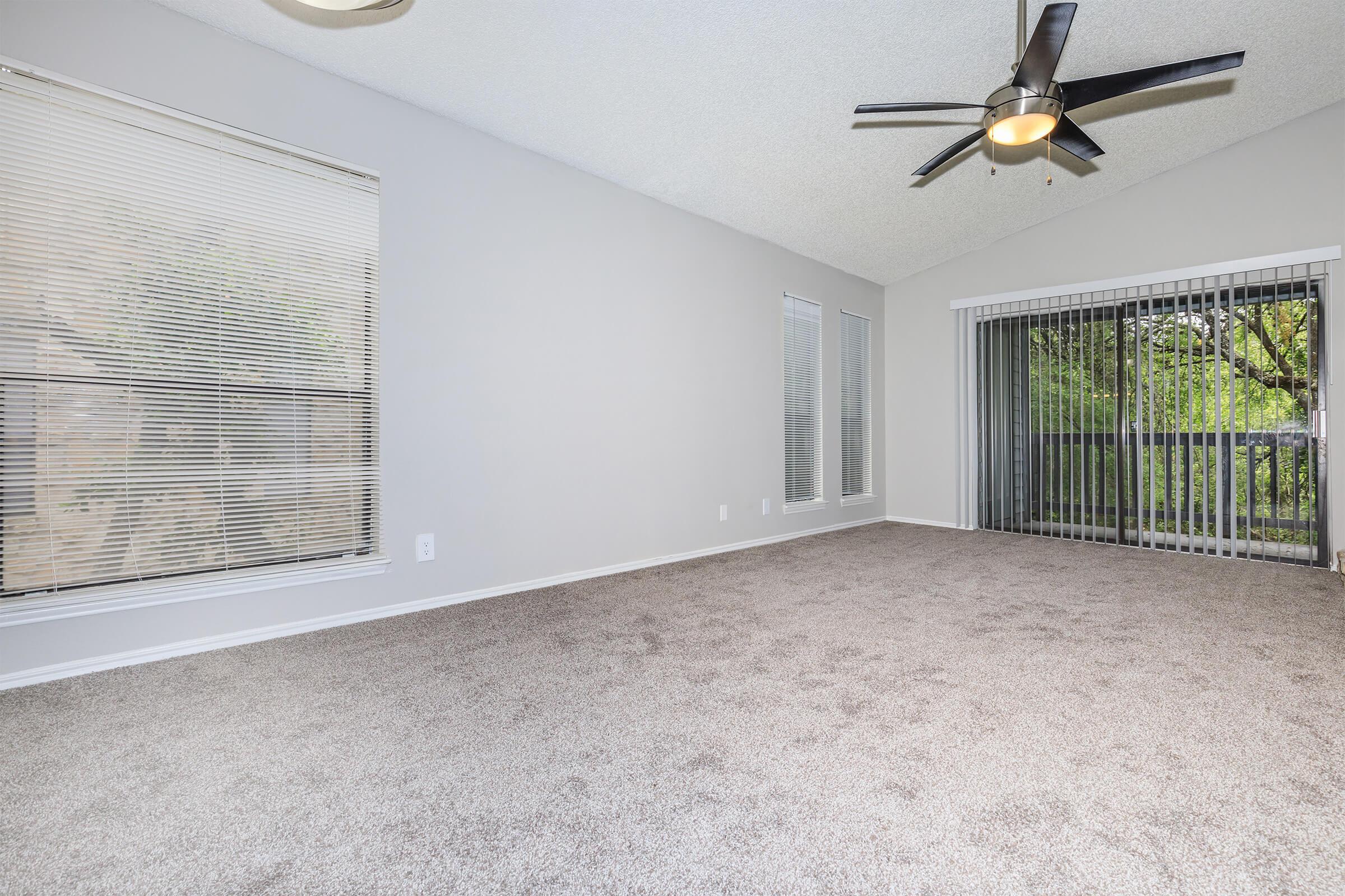 a living room next to a window