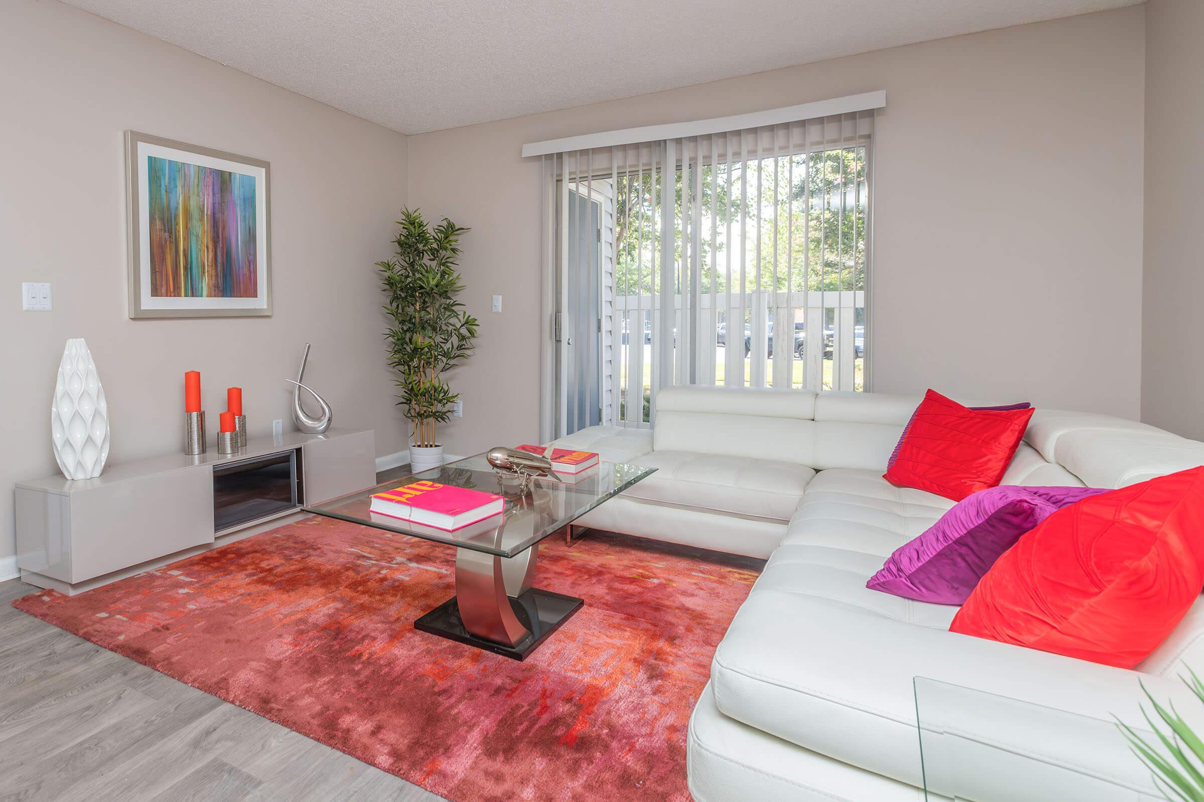 a large bed sitting in a living room