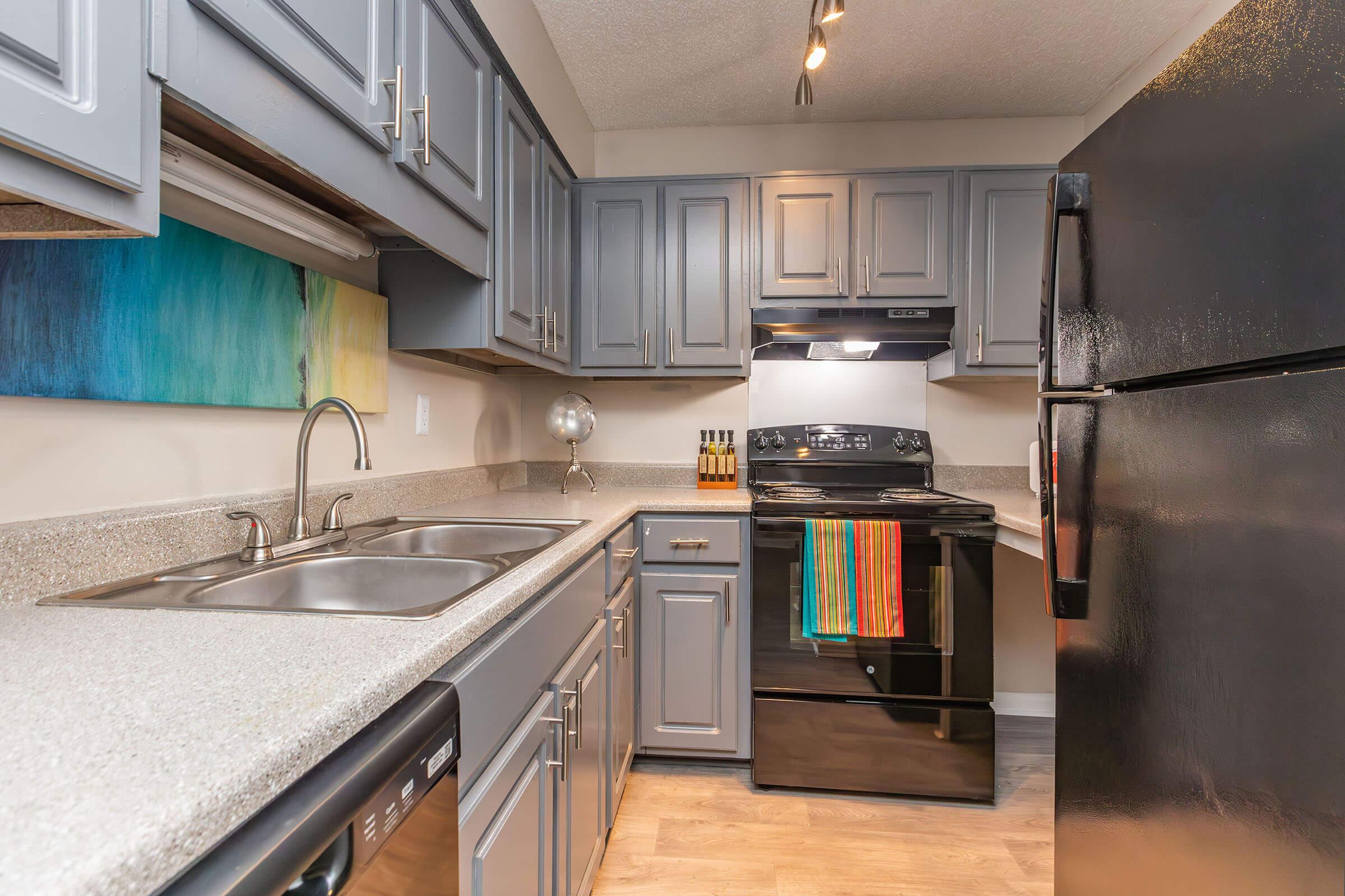 a modern kitchen with stainless steel appliances