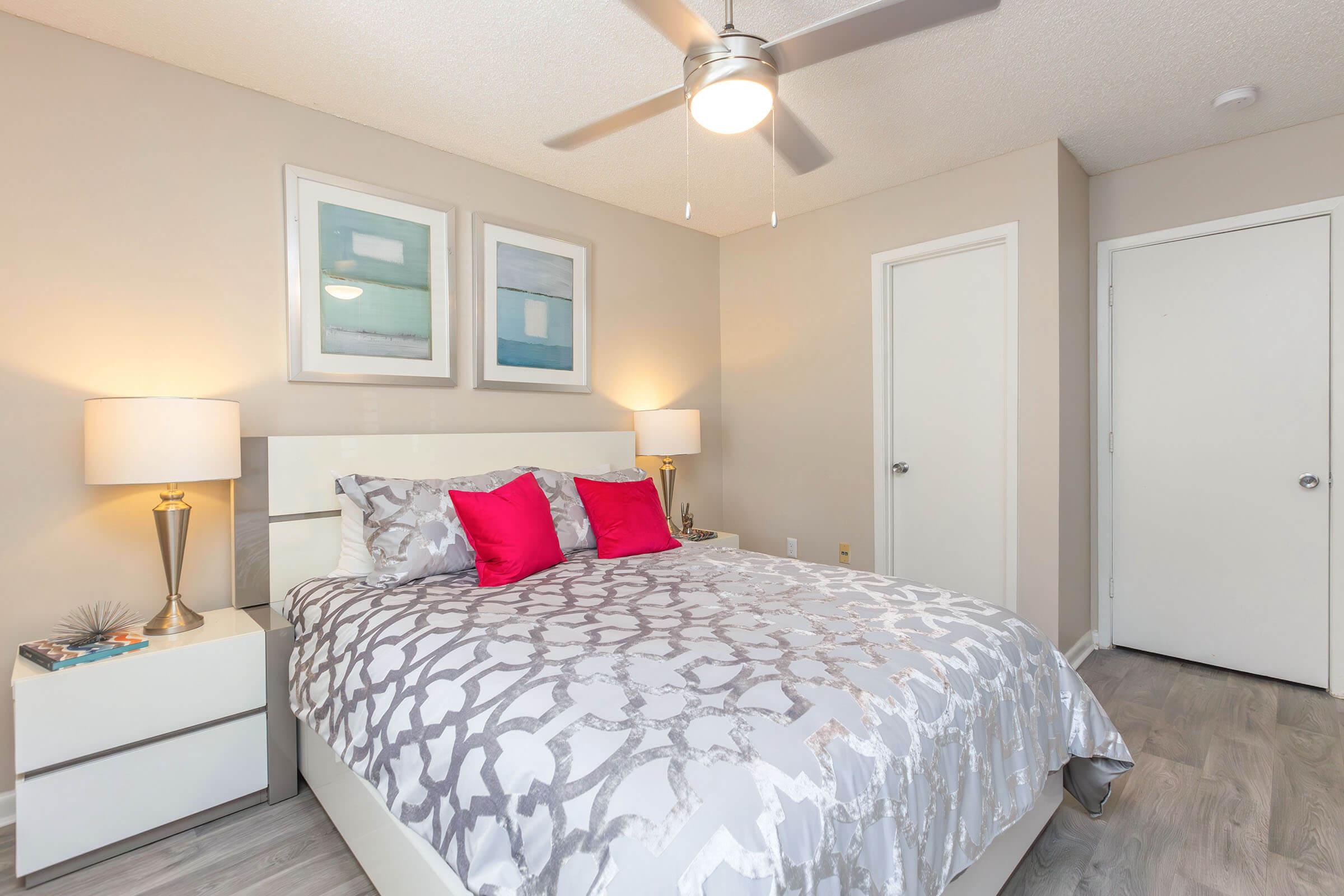 a bedroom with a bed in a hotel room