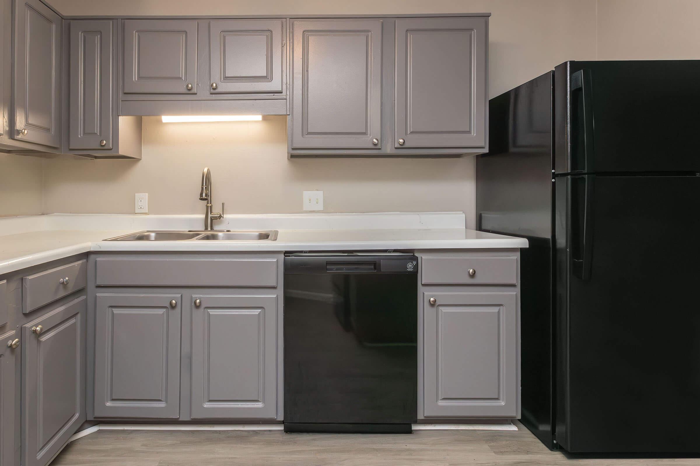 a stainless steel refrigerator in a kitchen