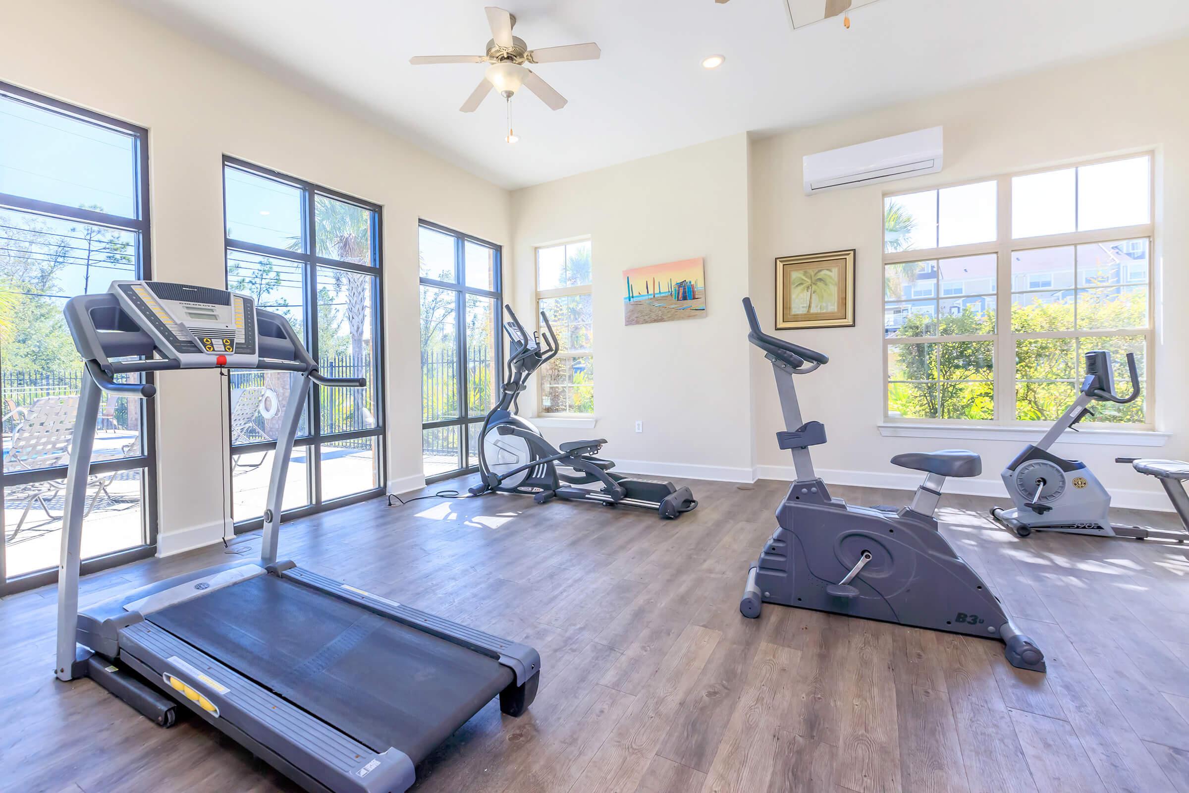 a room filled with furniture and a large window