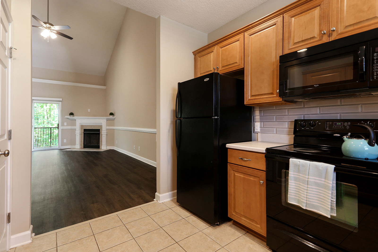 a large kitchen with stainless steel appliances