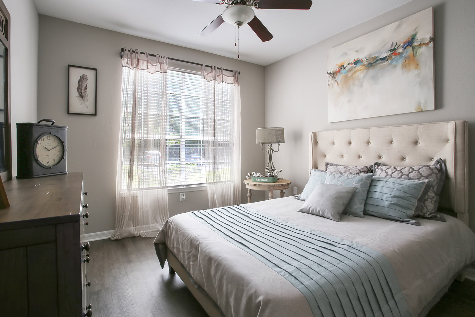 a bedroom with a large bed in a hotel room