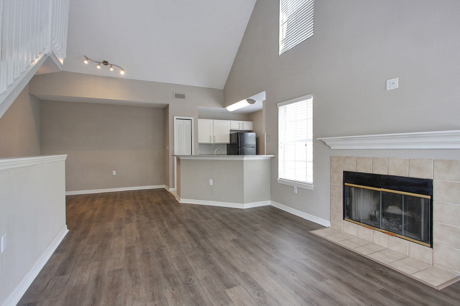 a living room with a wood floor