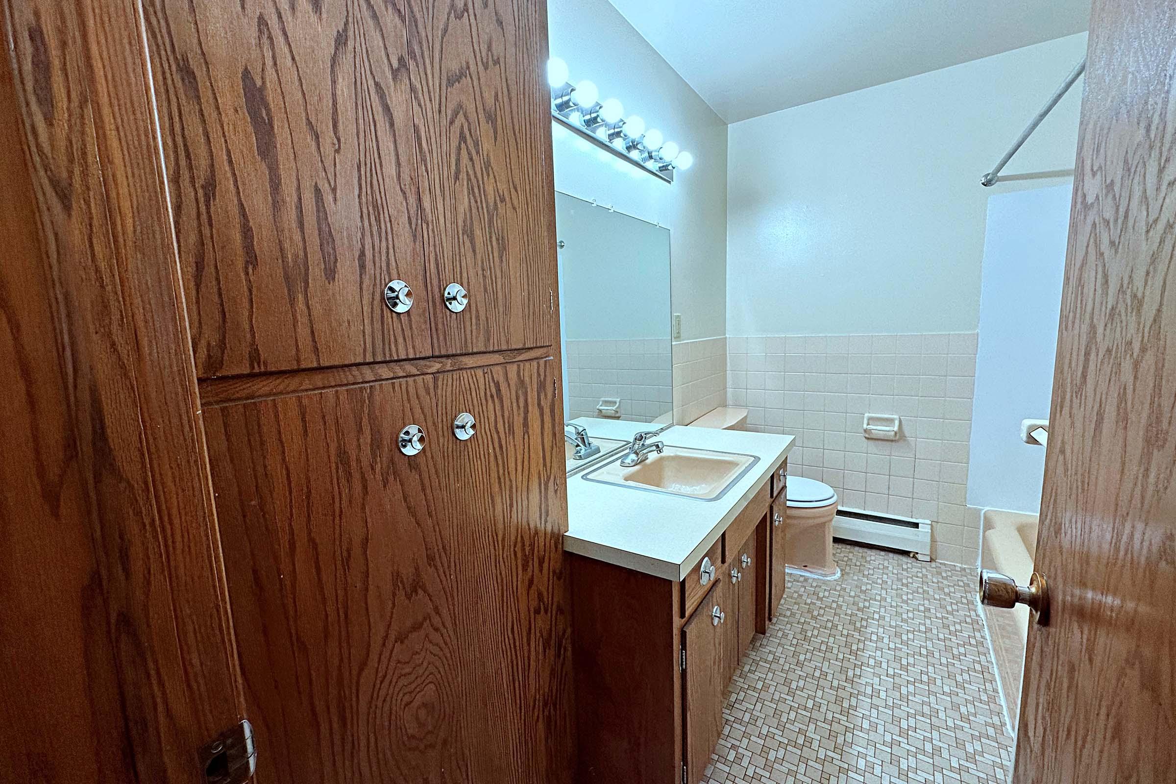 a bedroom with a wooden door