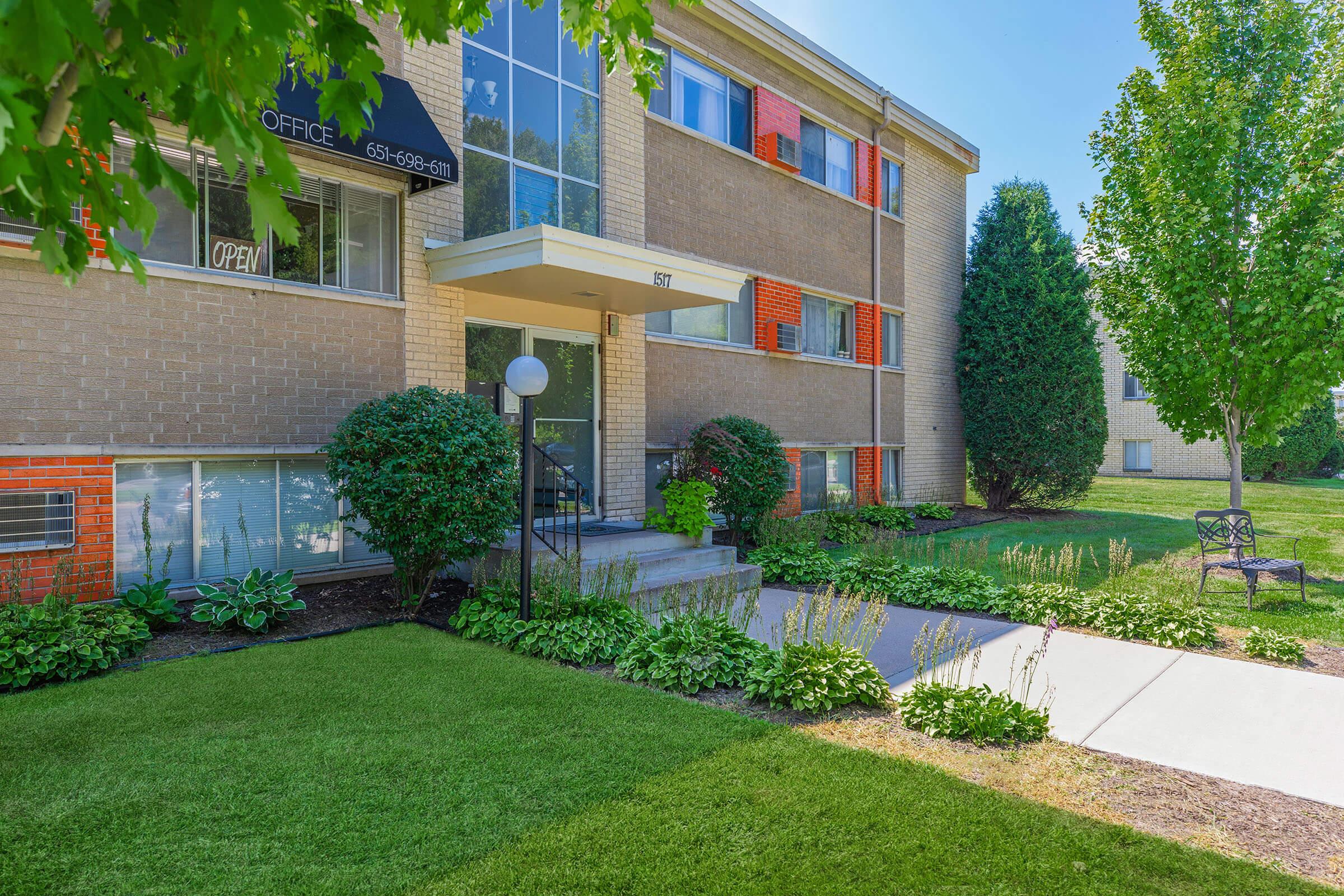 a large lawn in front of a building