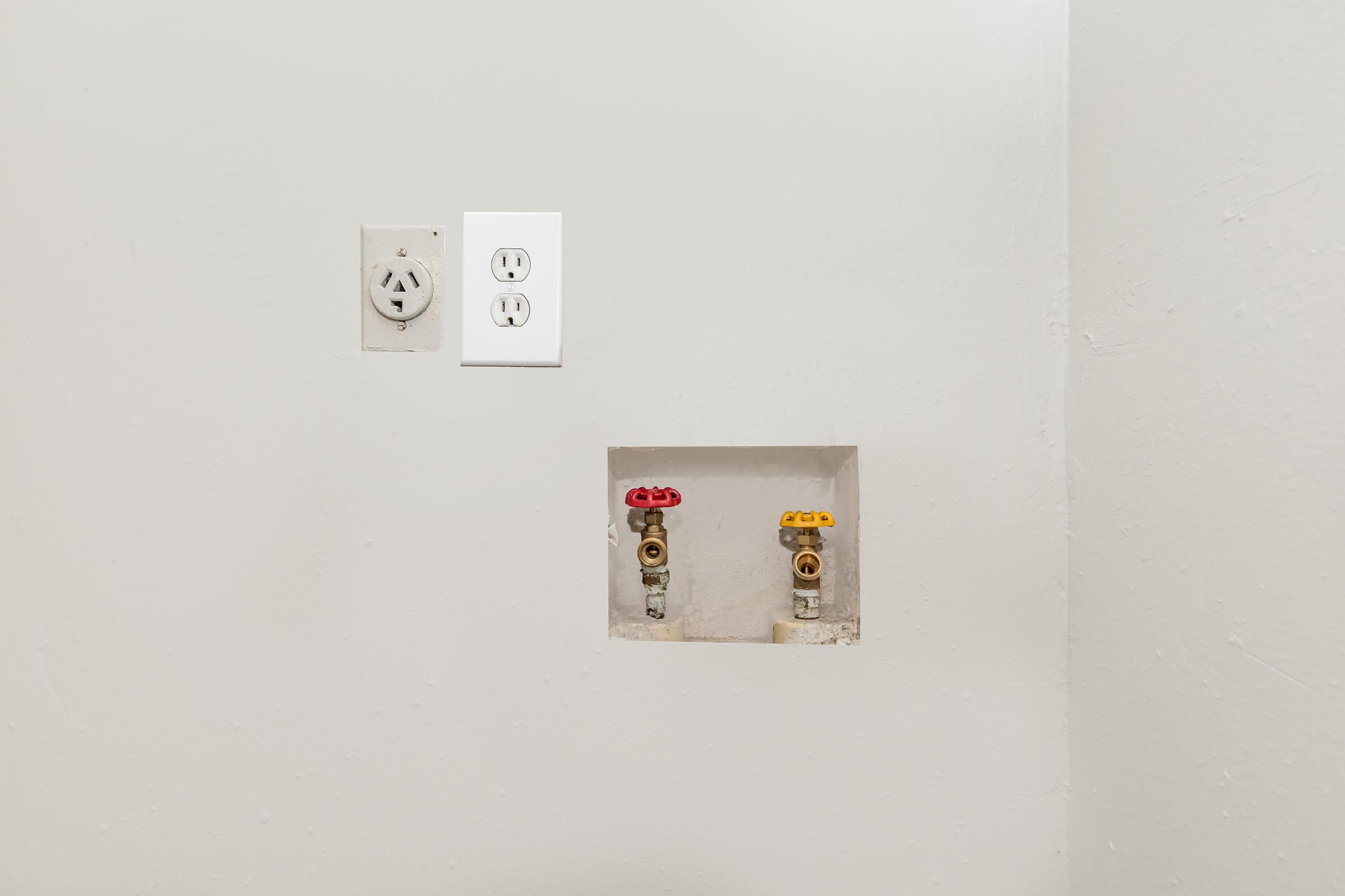 a refrigerator freezer sitting in a room