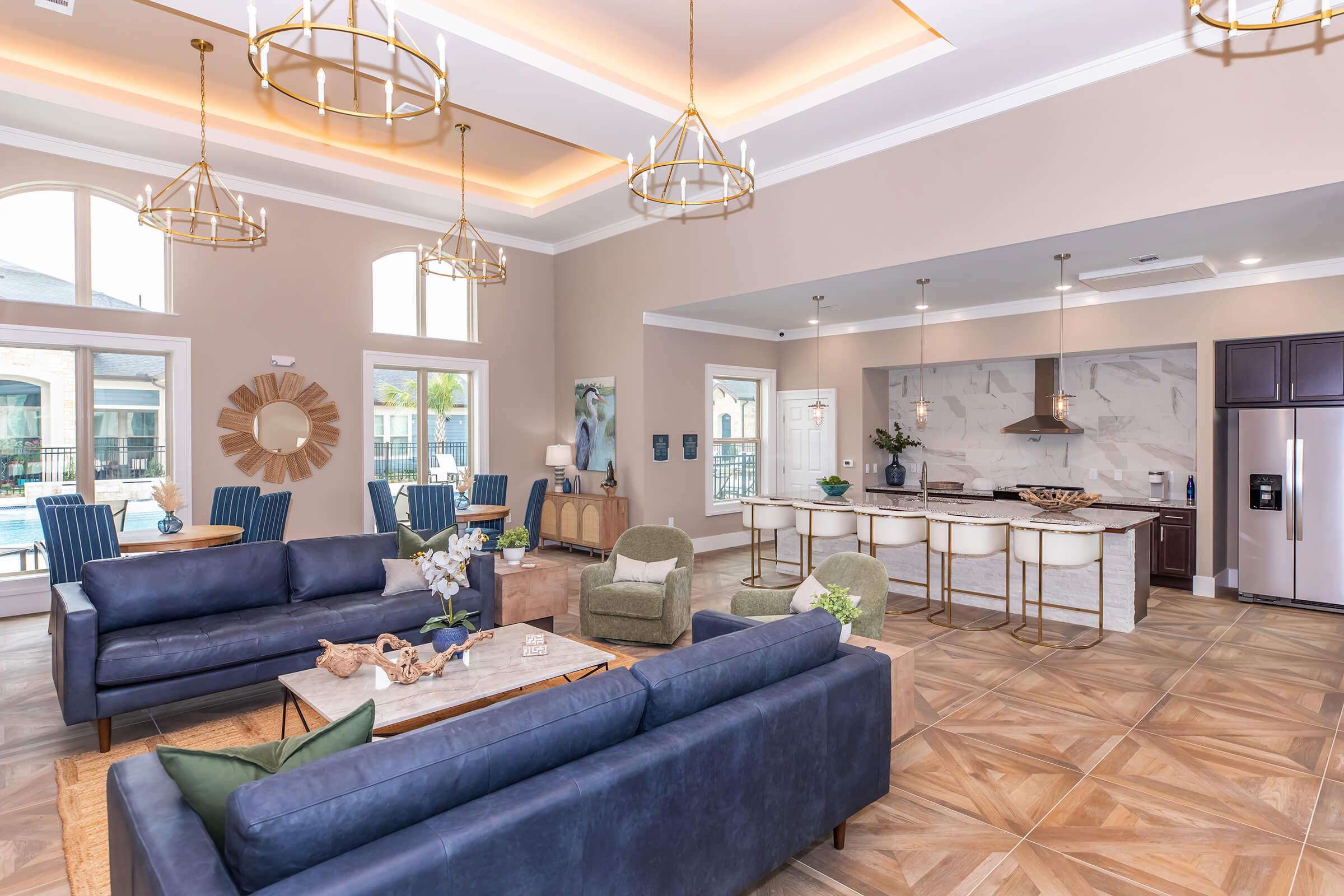 a living room filled with furniture and a fireplace