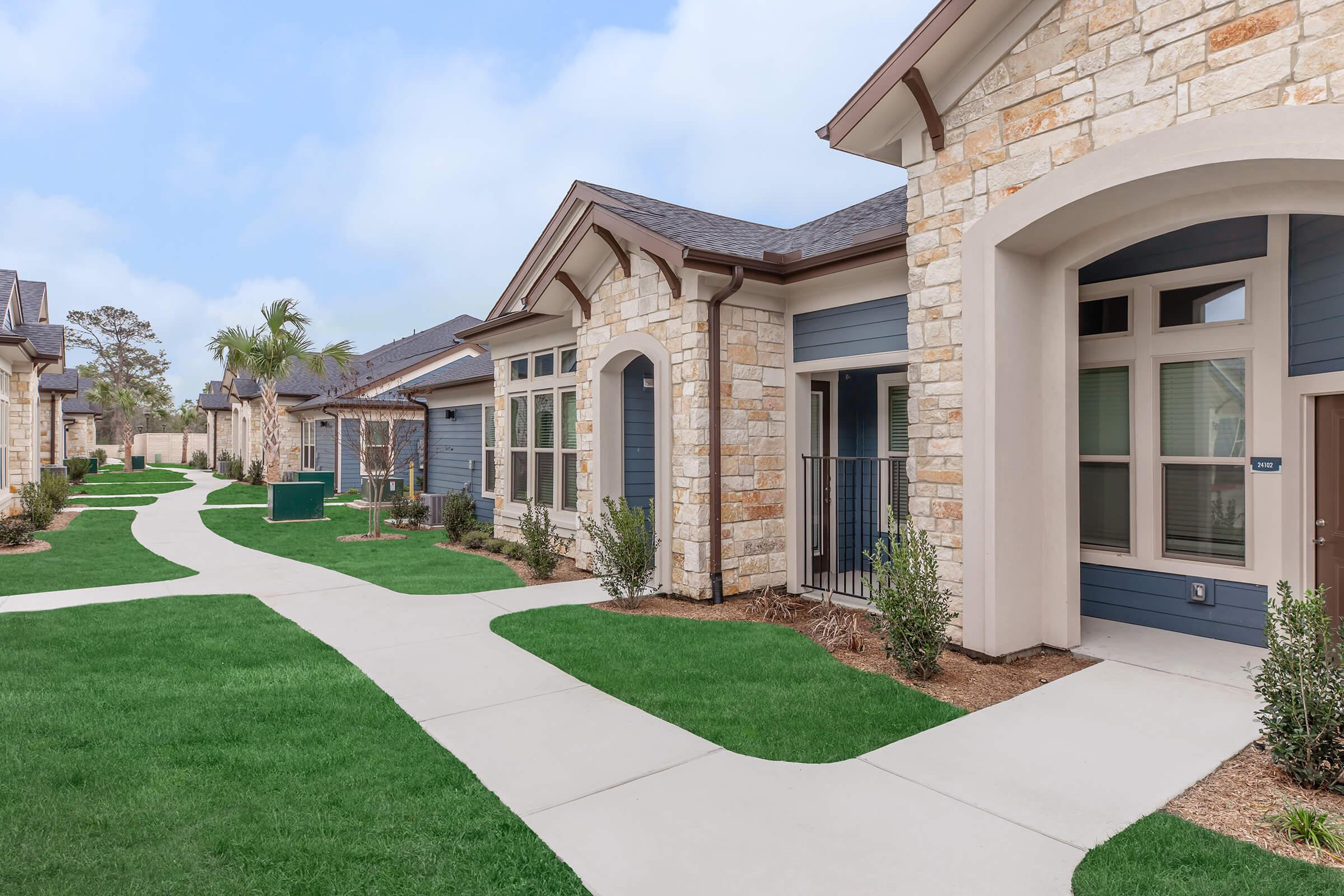 a large lawn in front of a house