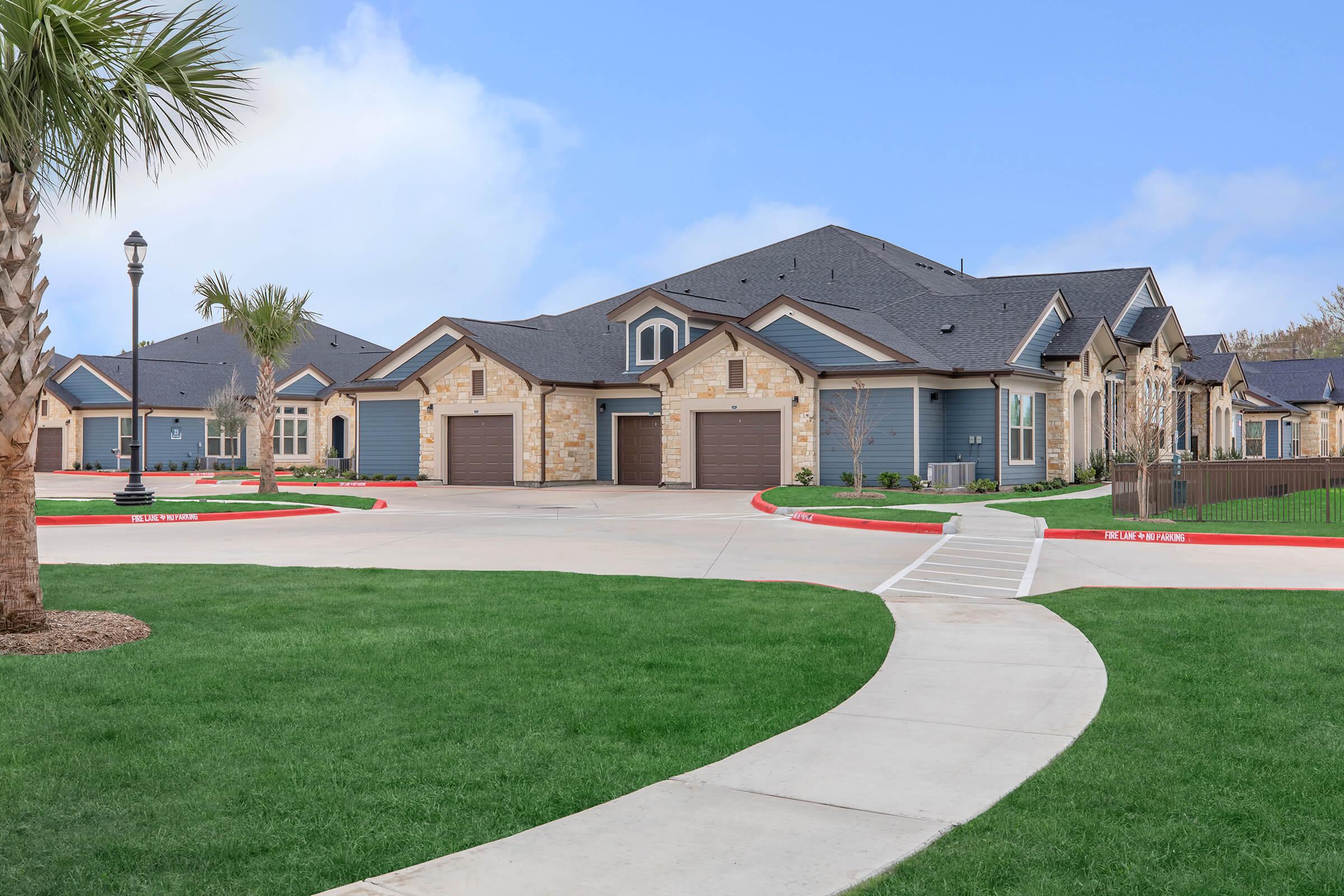 a large lawn in front of a house