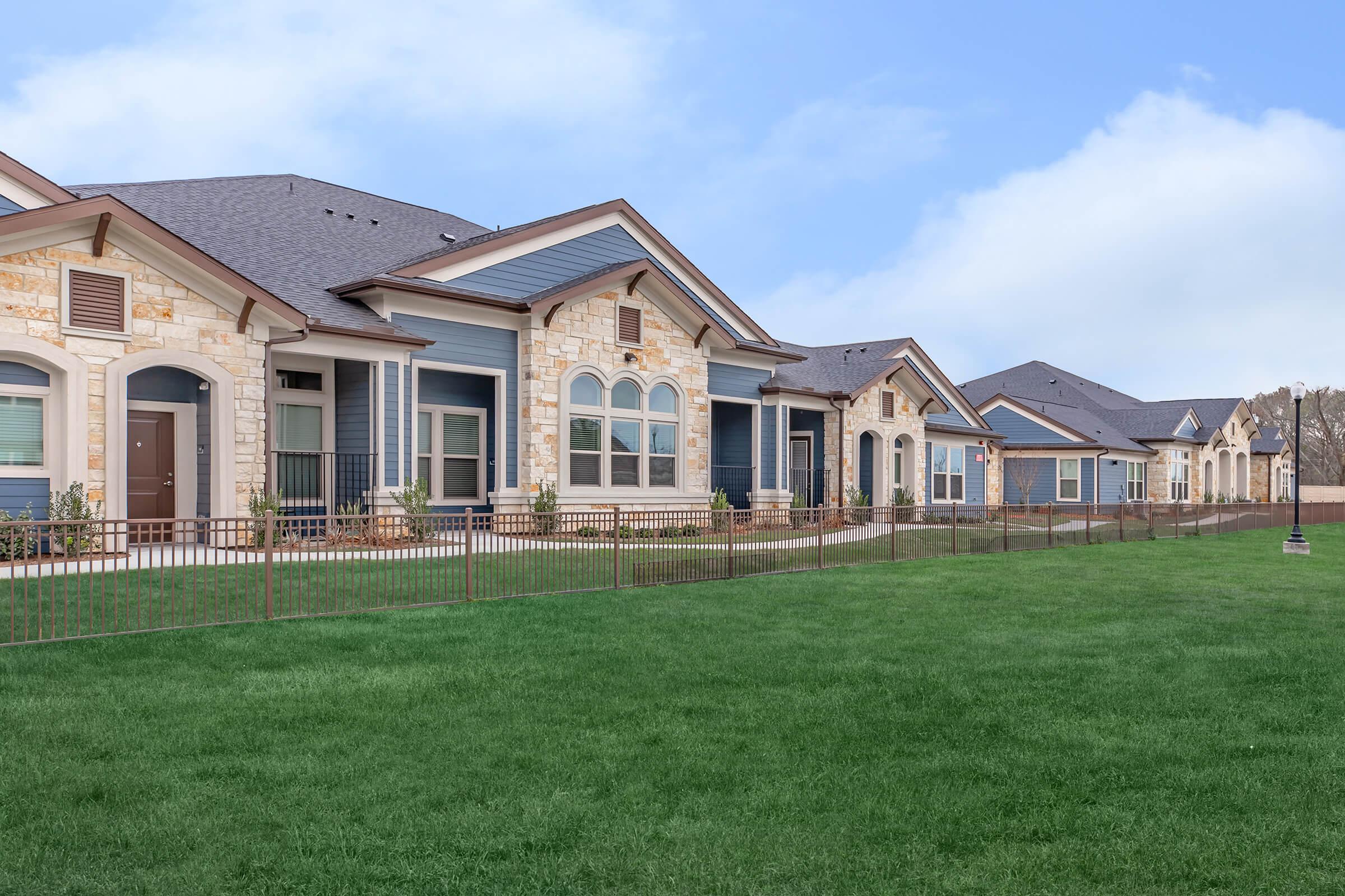 a large lawn in front of a house