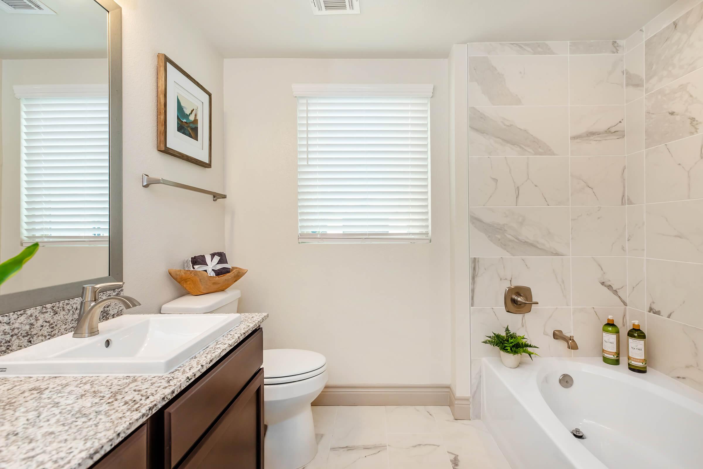 a room with a sink and a window