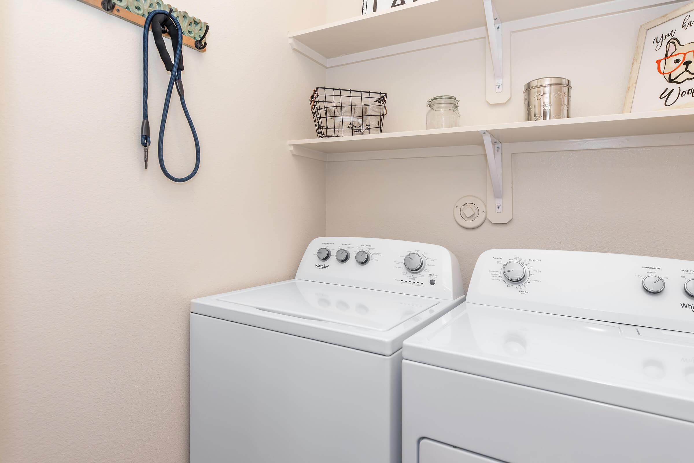 a kitchen with a sink and a mirror