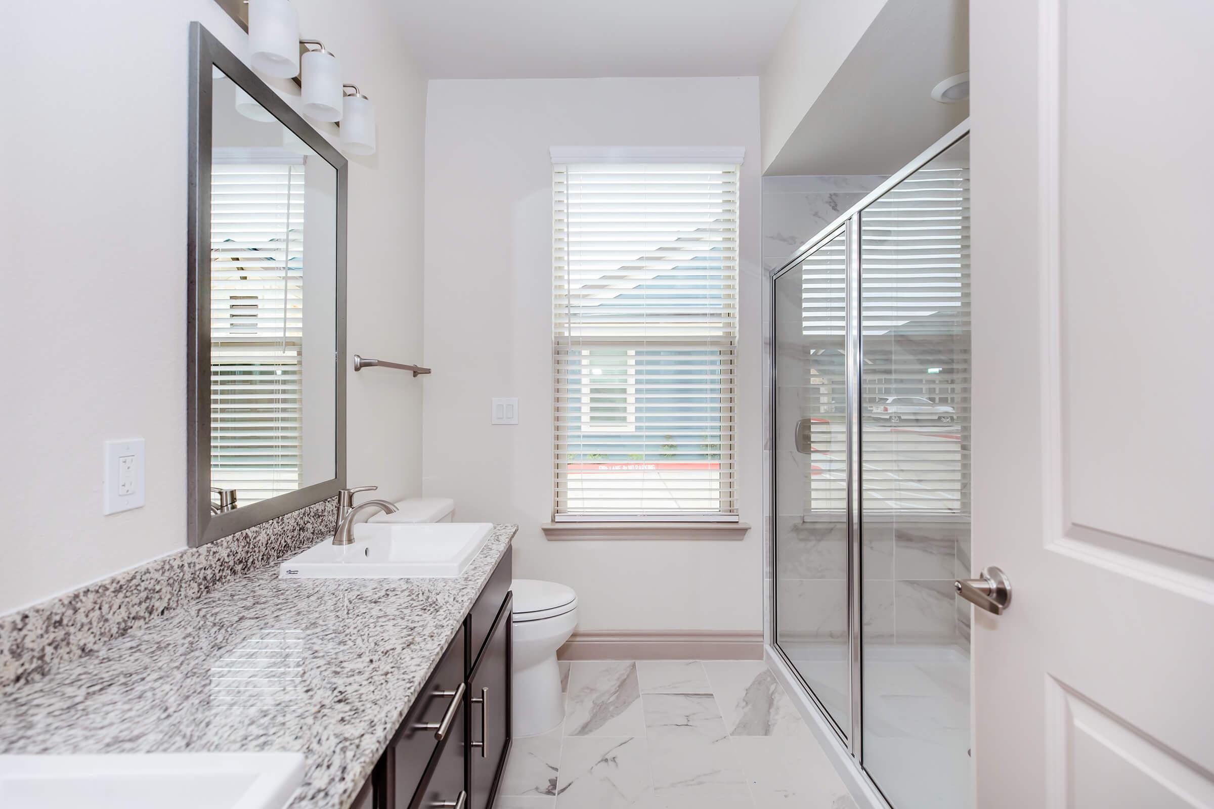 a kitchen with a sink and a window