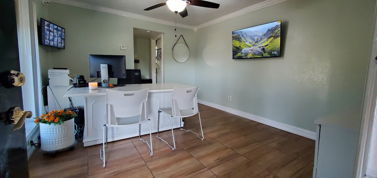 a room filled with furniture and a fireplace