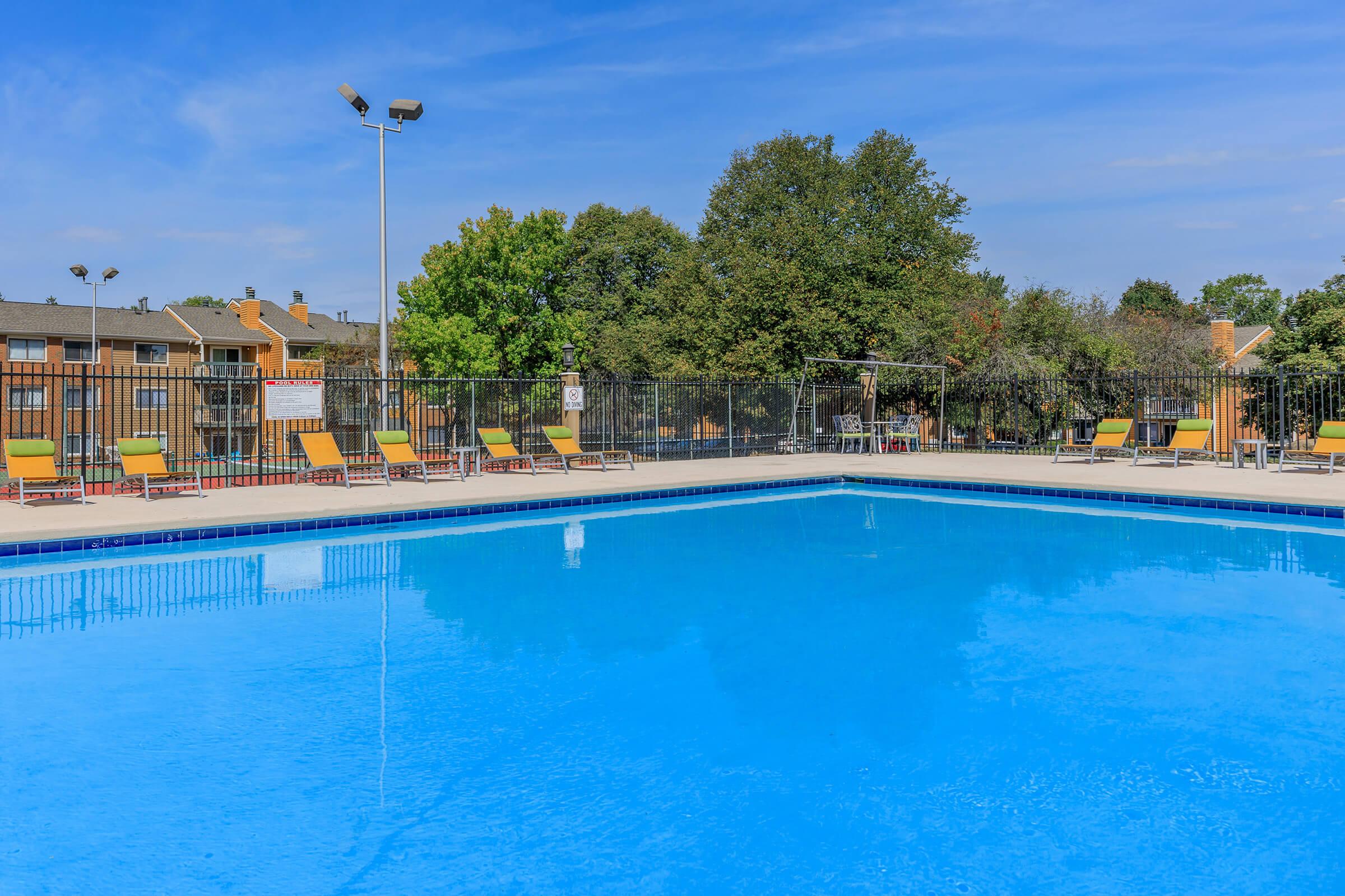 a pool next to a body of water