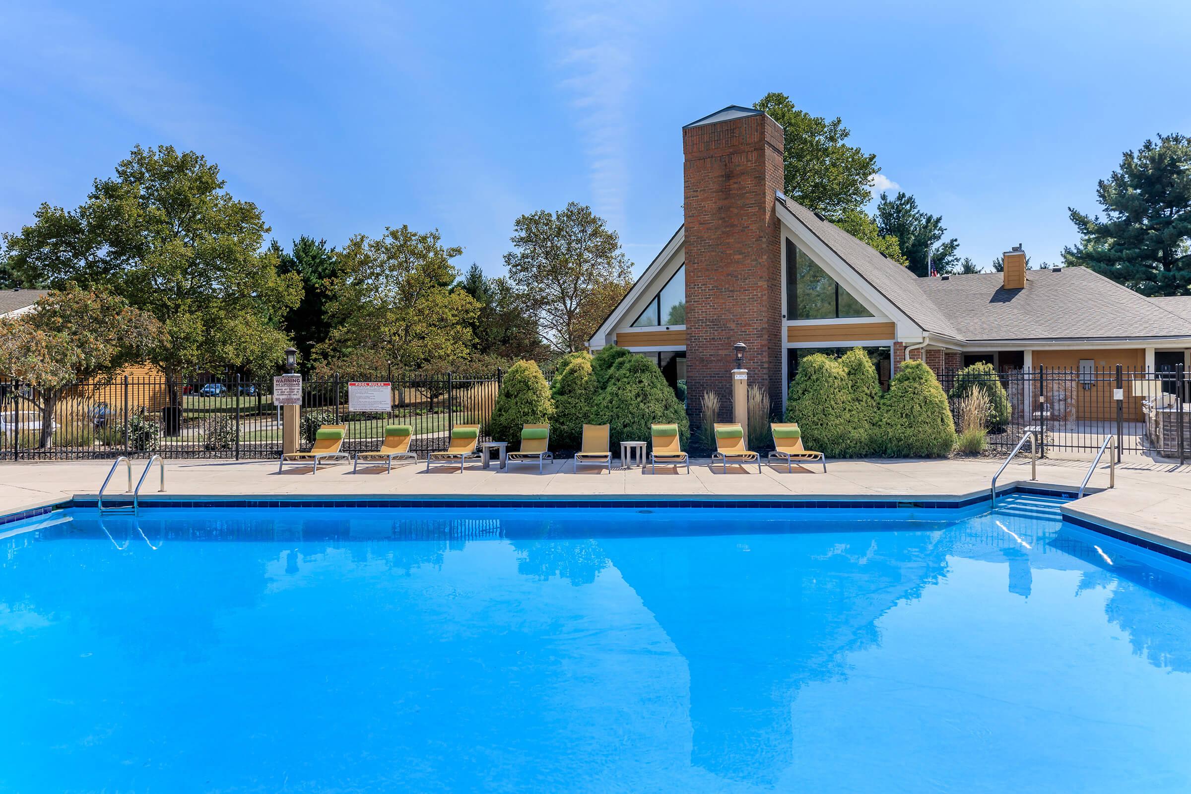 a pool next to a body of water