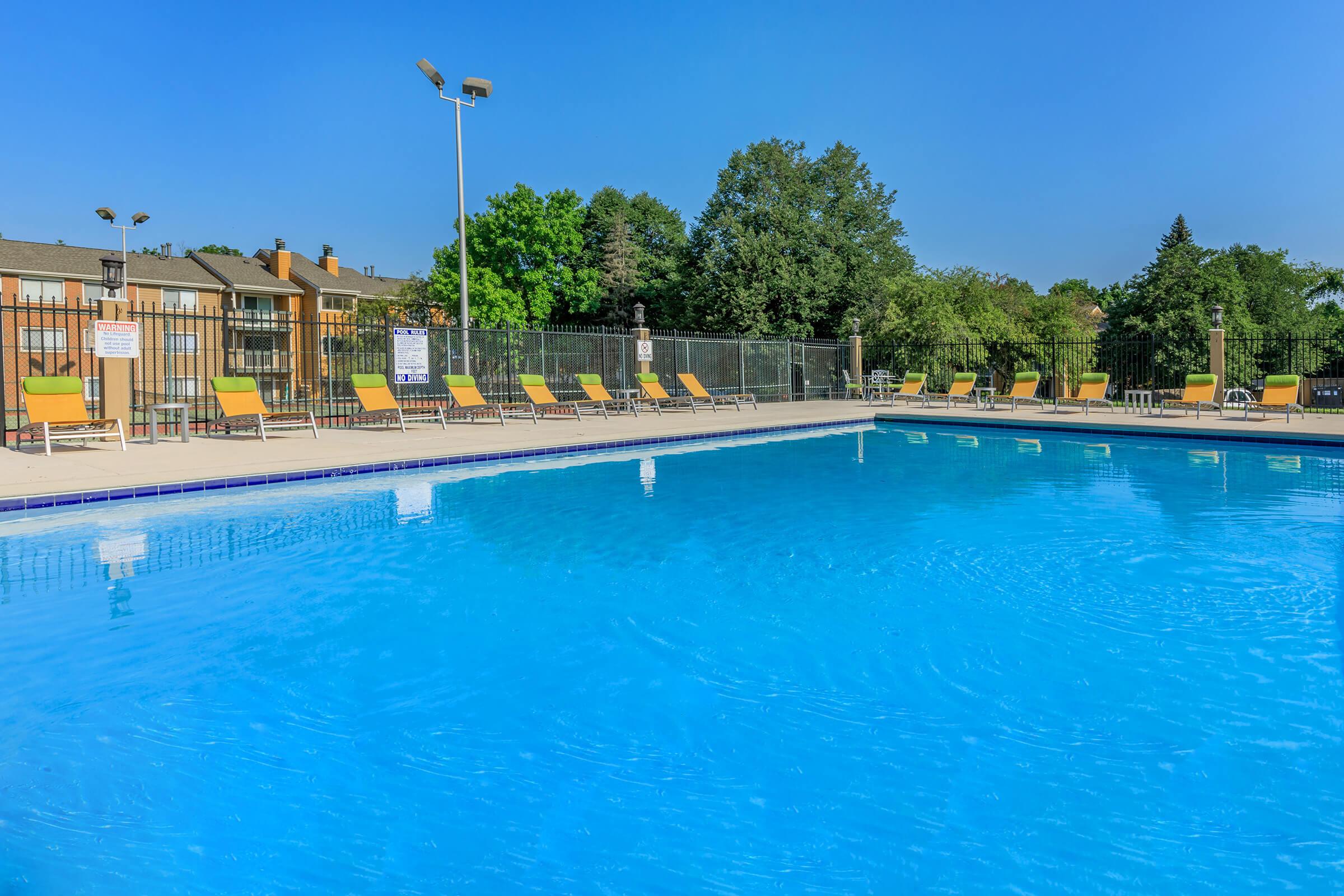 a pool next to a body of water