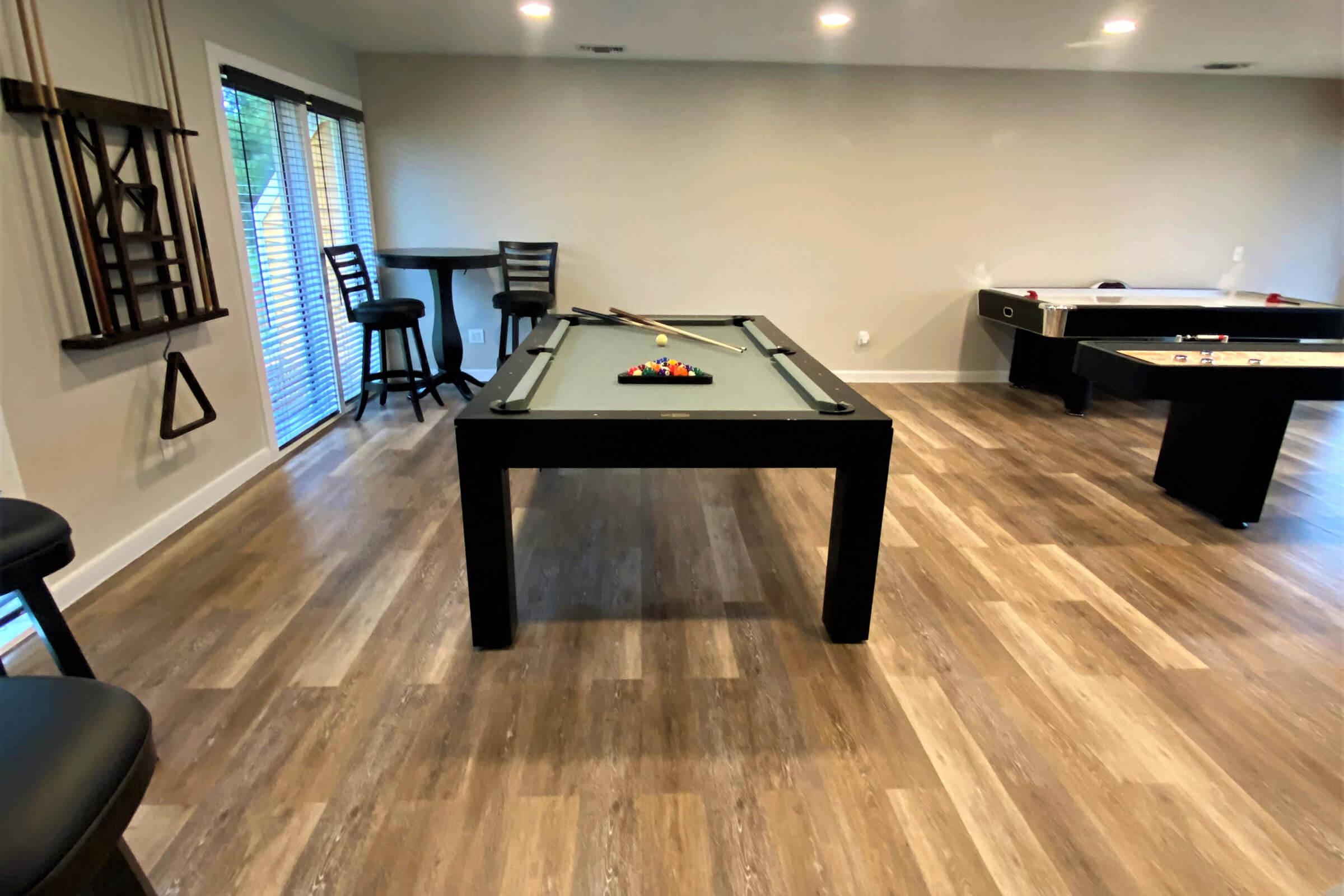 a modern living room with a wood floor
