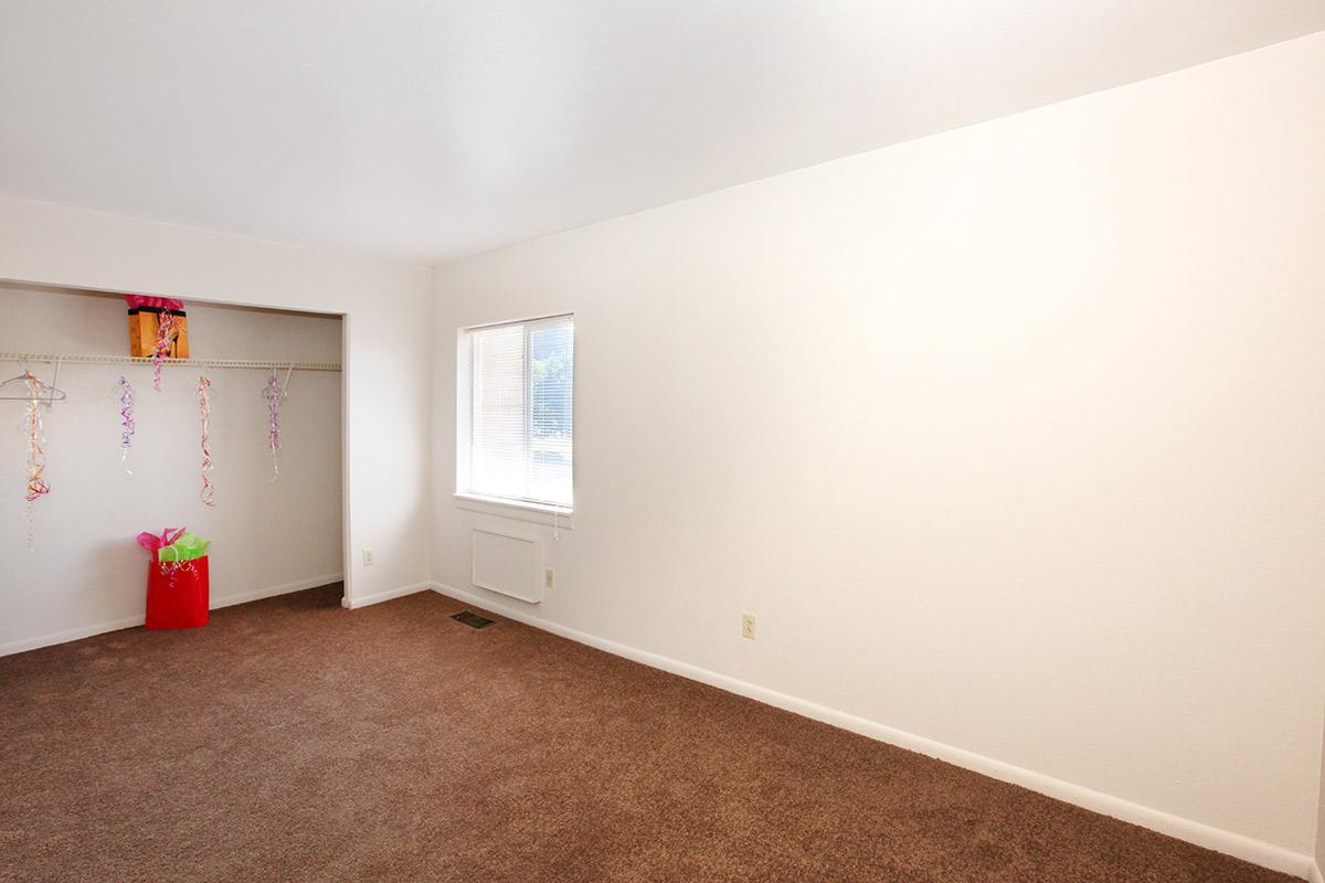 a white refrigerator freezer sitting in a room